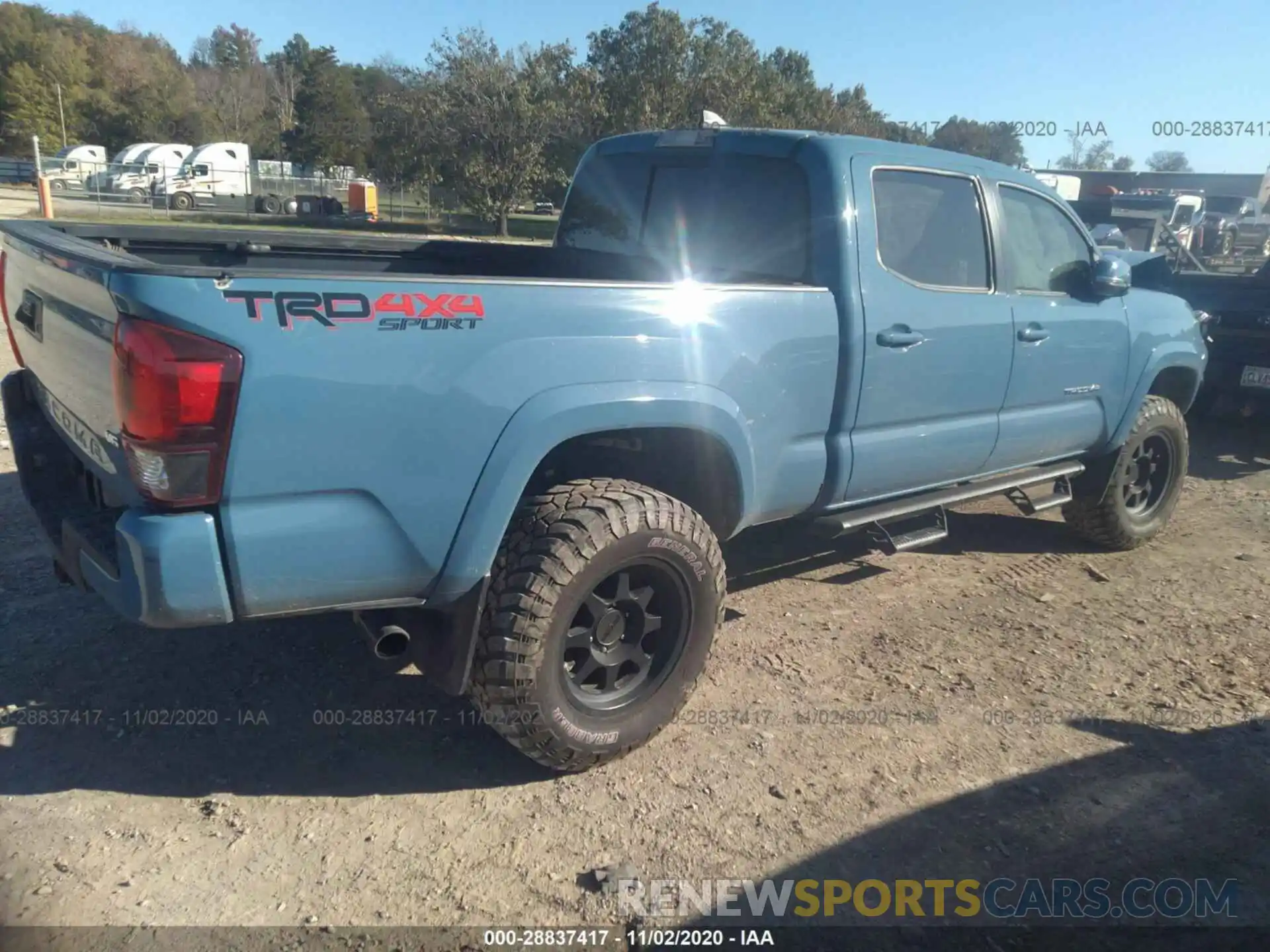 4 Photograph of a damaged car 3TMDZ5BN0KM061913 TOYOTA TACOMA 4WD 2019