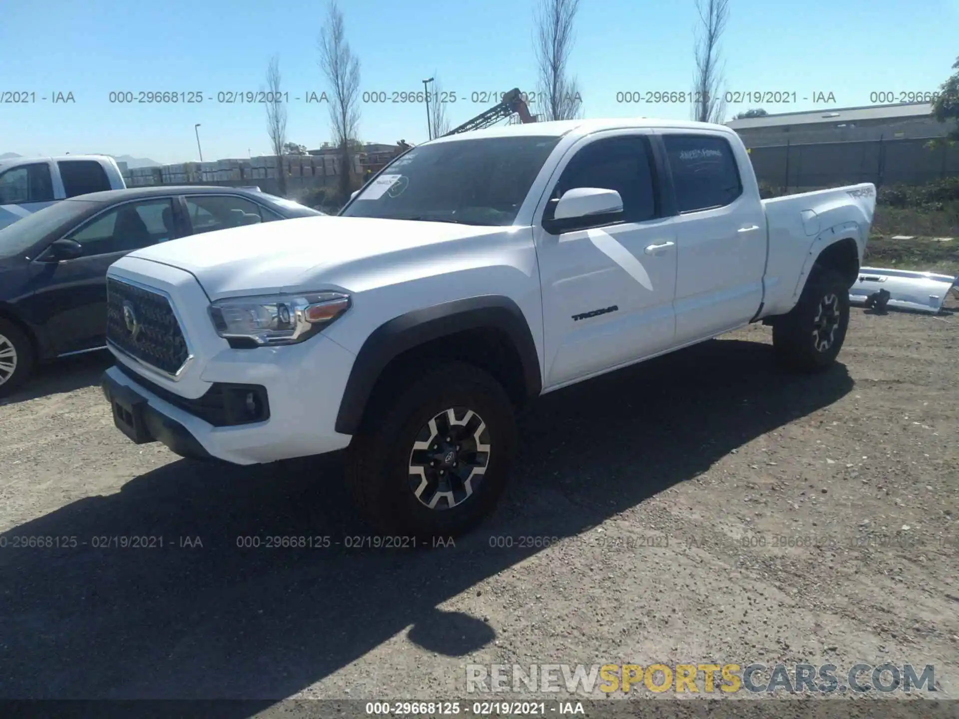 2 Photograph of a damaged car 3TMDZ5BN0KM067128 TOYOTA TACOMA 4WD 2019