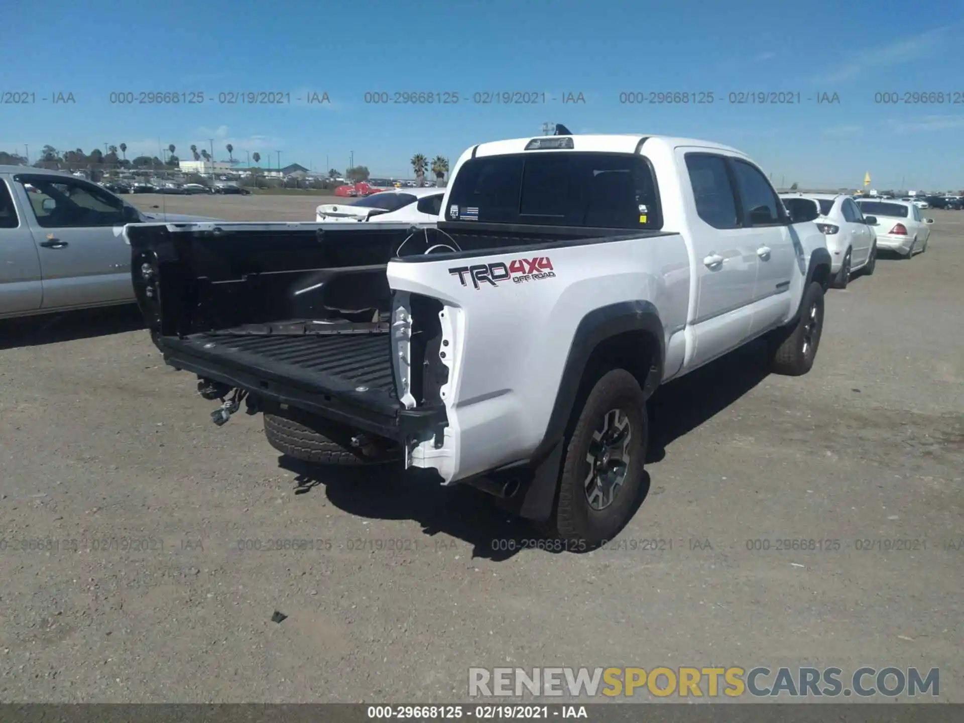 4 Photograph of a damaged car 3TMDZ5BN0KM067128 TOYOTA TACOMA 4WD 2019