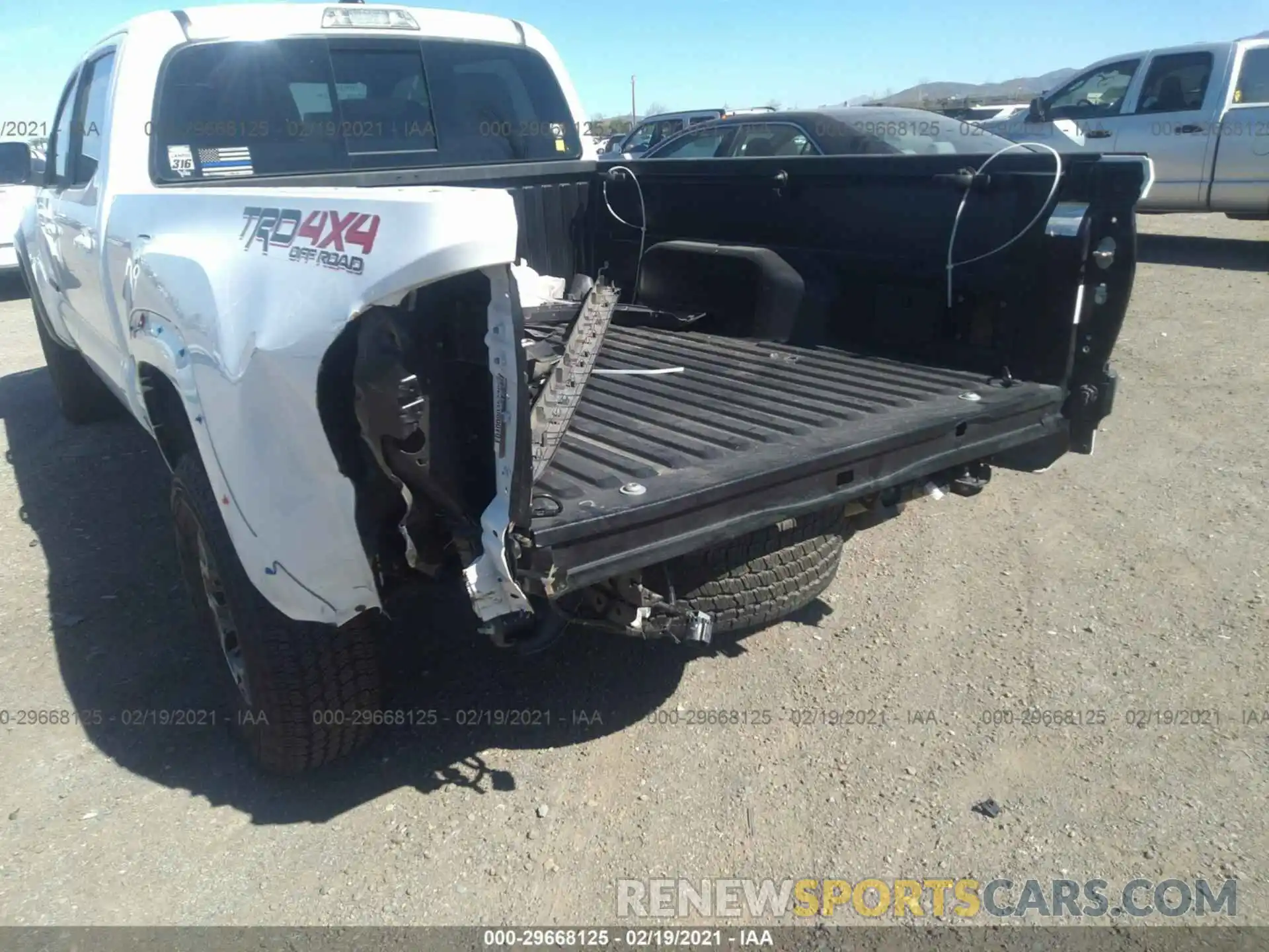 6 Photograph of a damaged car 3TMDZ5BN0KM067128 TOYOTA TACOMA 4WD 2019