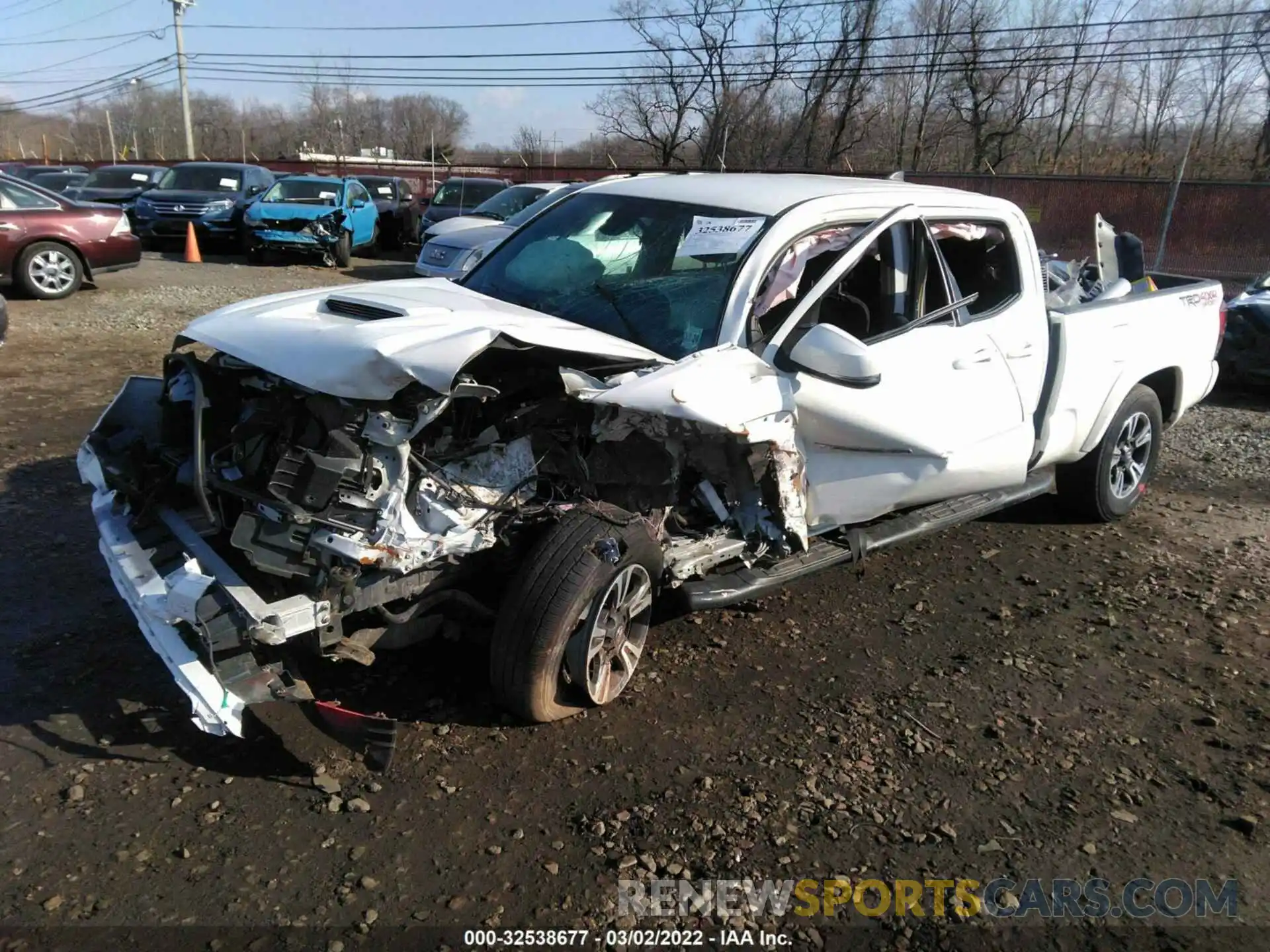 2 Photograph of a damaged car 3TMDZ5BN0KM067887 TOYOTA TACOMA 4WD 2019