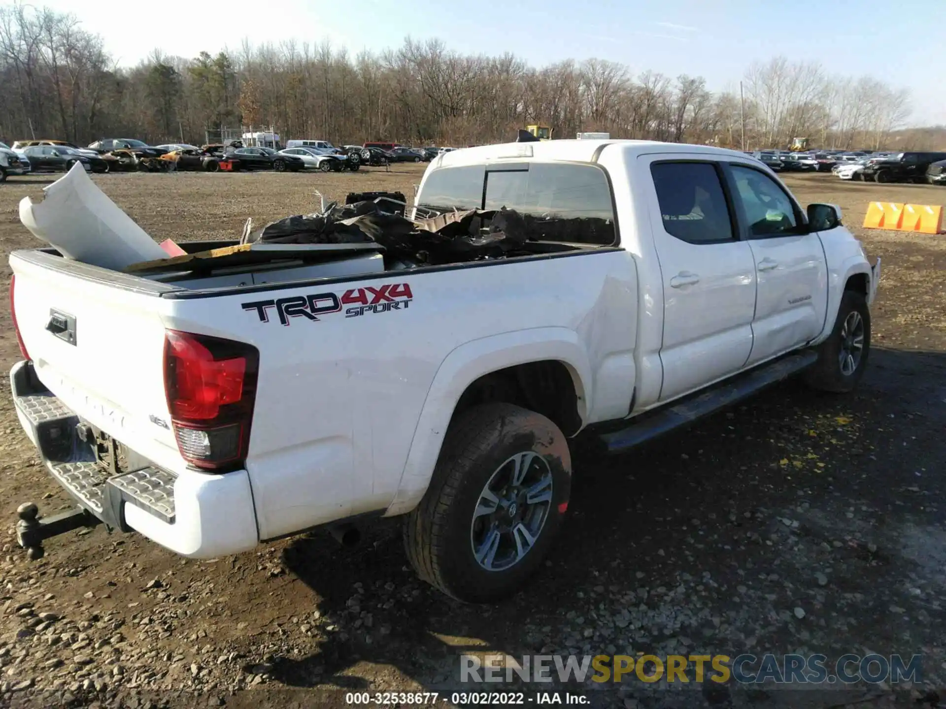 4 Photograph of a damaged car 3TMDZ5BN0KM067887 TOYOTA TACOMA 4WD 2019