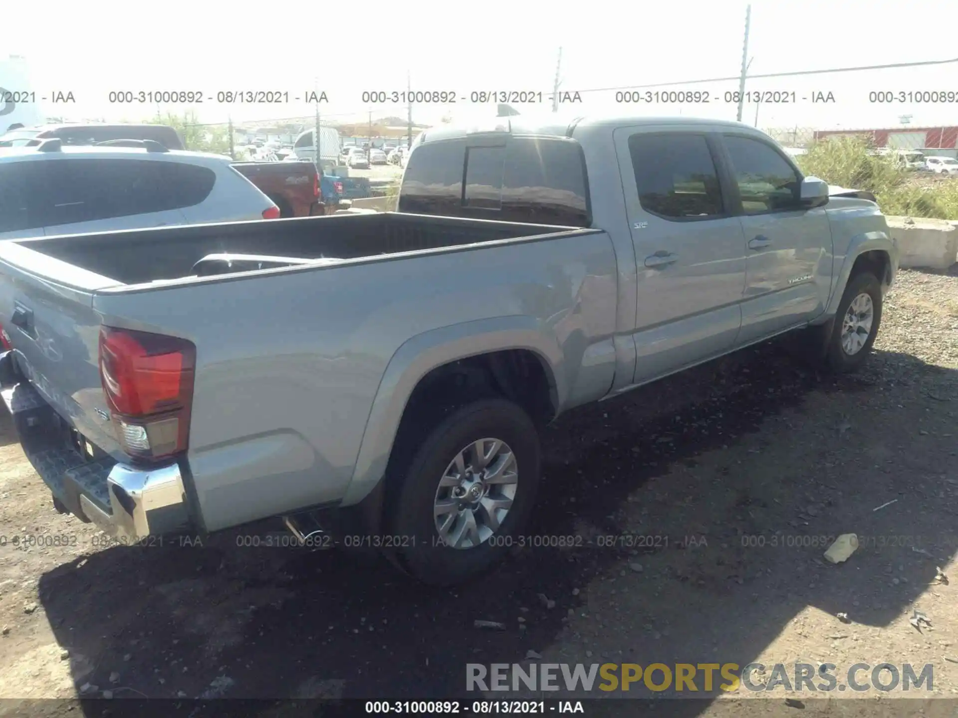 4 Photograph of a damaged car 3TMDZ5BN0KM074676 TOYOTA TACOMA 4WD 2019