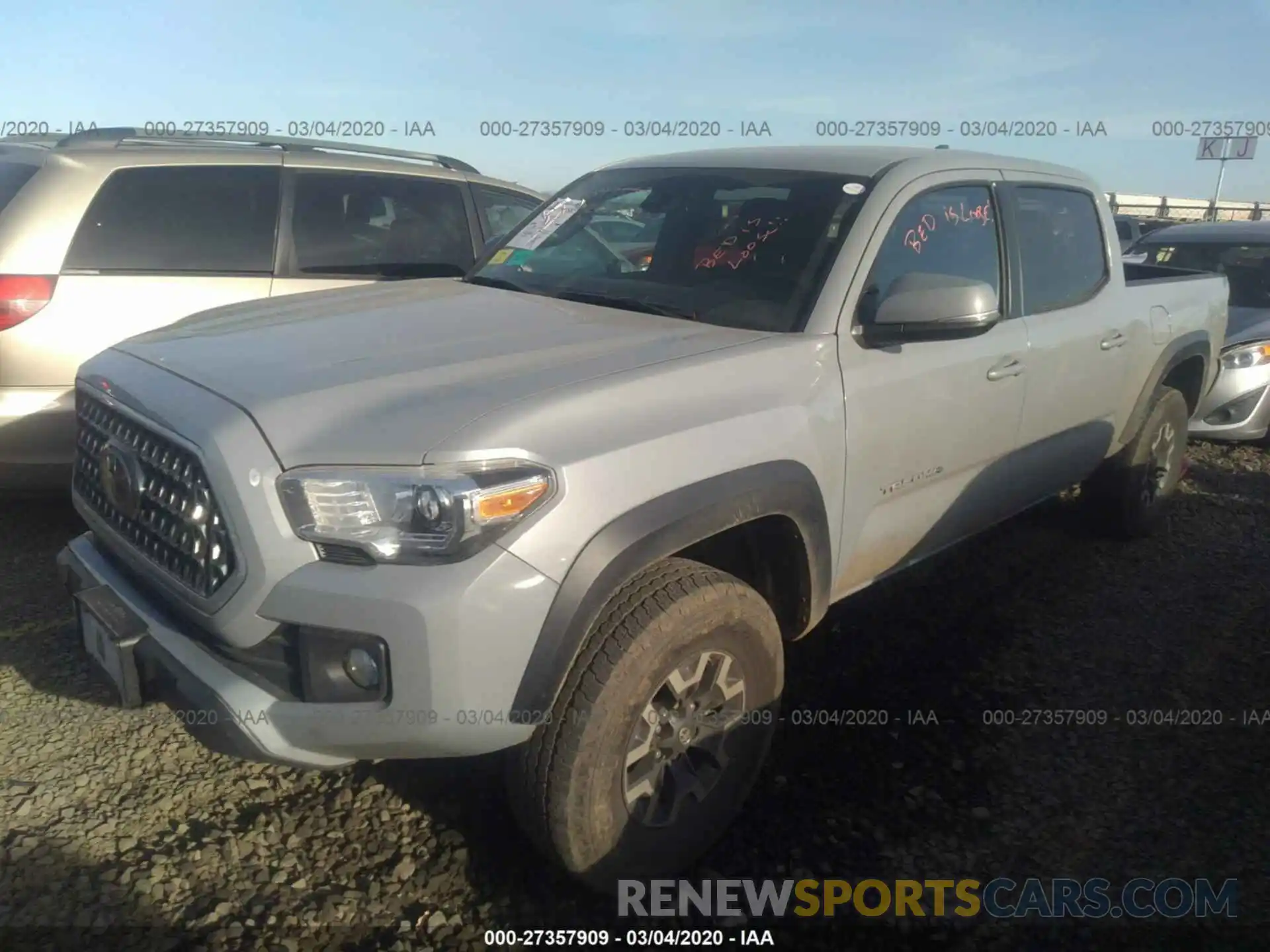 2 Photograph of a damaged car 3TMDZ5BN0KM075844 TOYOTA TACOMA 4WD 2019