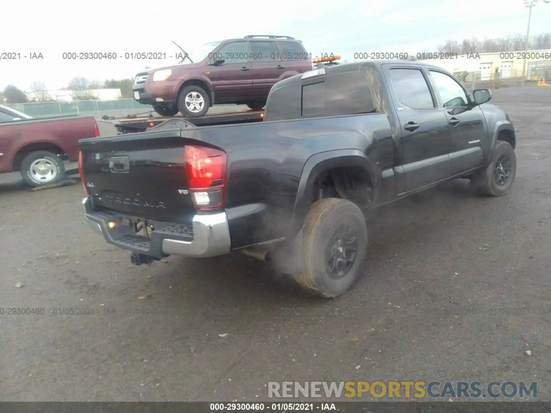 4 Photograph of a damaged car 3TMDZ5BN1KM061547 TOYOTA TACOMA 4WD 2019