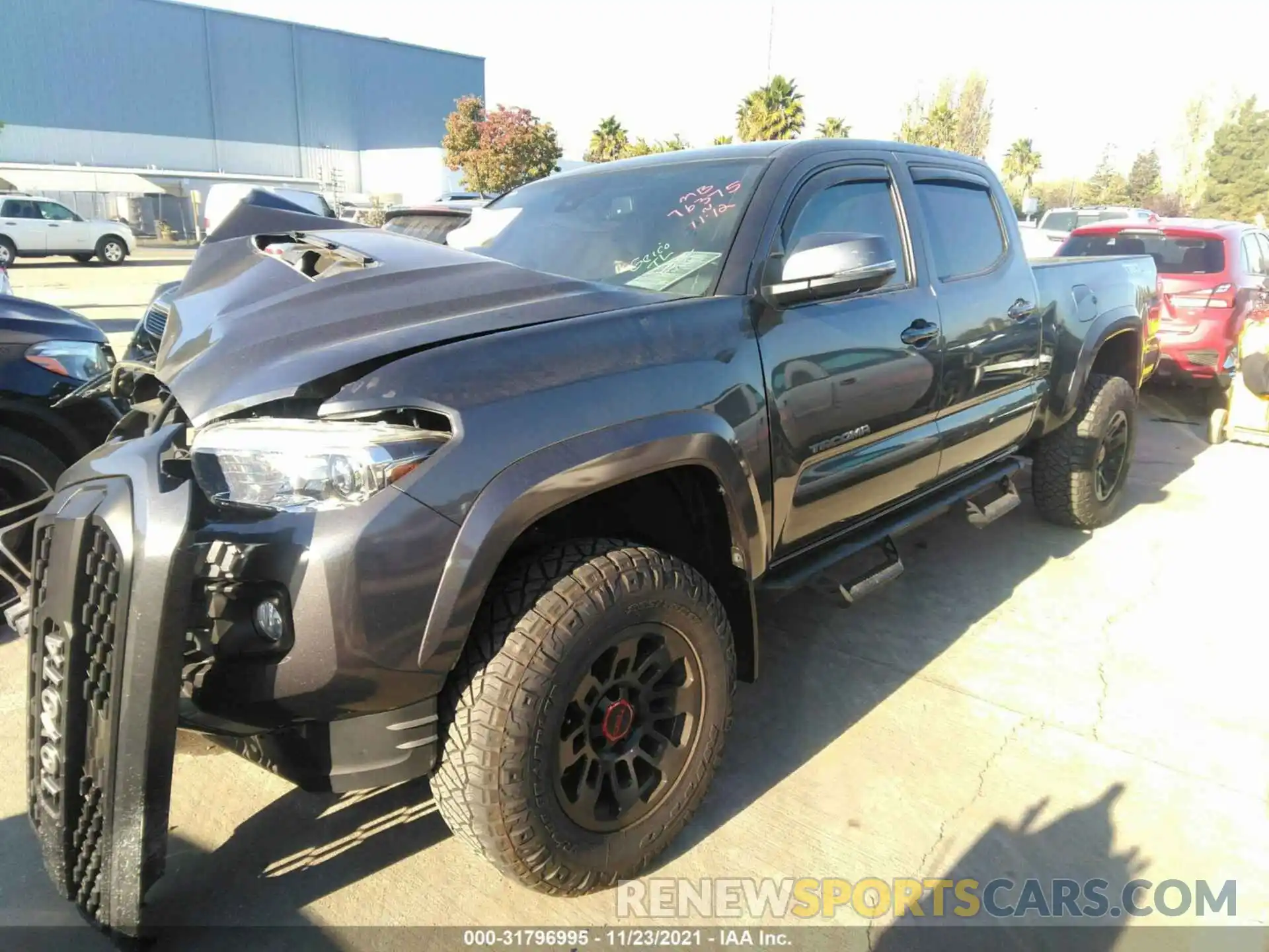 2 Photograph of a damaged car 3TMDZ5BN1KM063900 TOYOTA TACOMA 4WD 2019