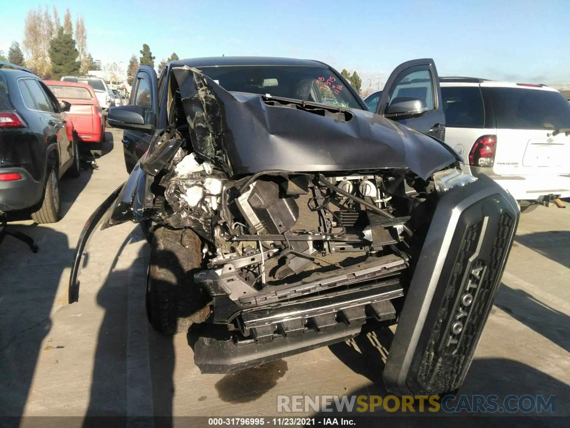 6 Photograph of a damaged car 3TMDZ5BN1KM063900 TOYOTA TACOMA 4WD 2019