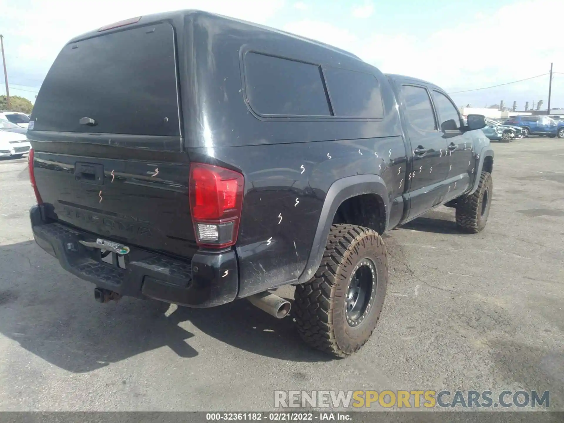 4 Photograph of a damaged car 3TMDZ5BN1KM065808 TOYOTA TACOMA 4WD 2019