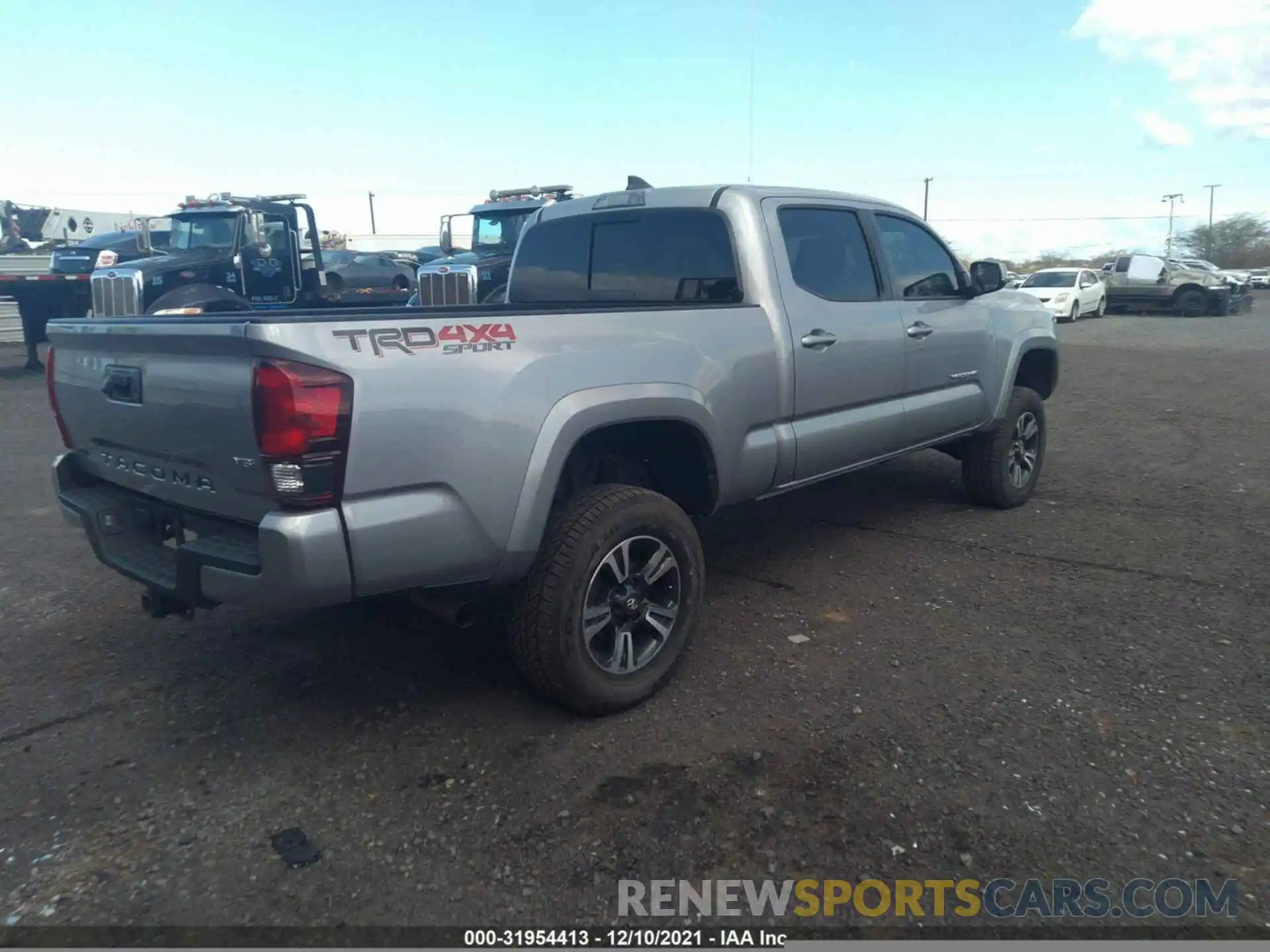 4 Photograph of a damaged car 3TMDZ5BN1KM072063 TOYOTA TACOMA 4WD 2019