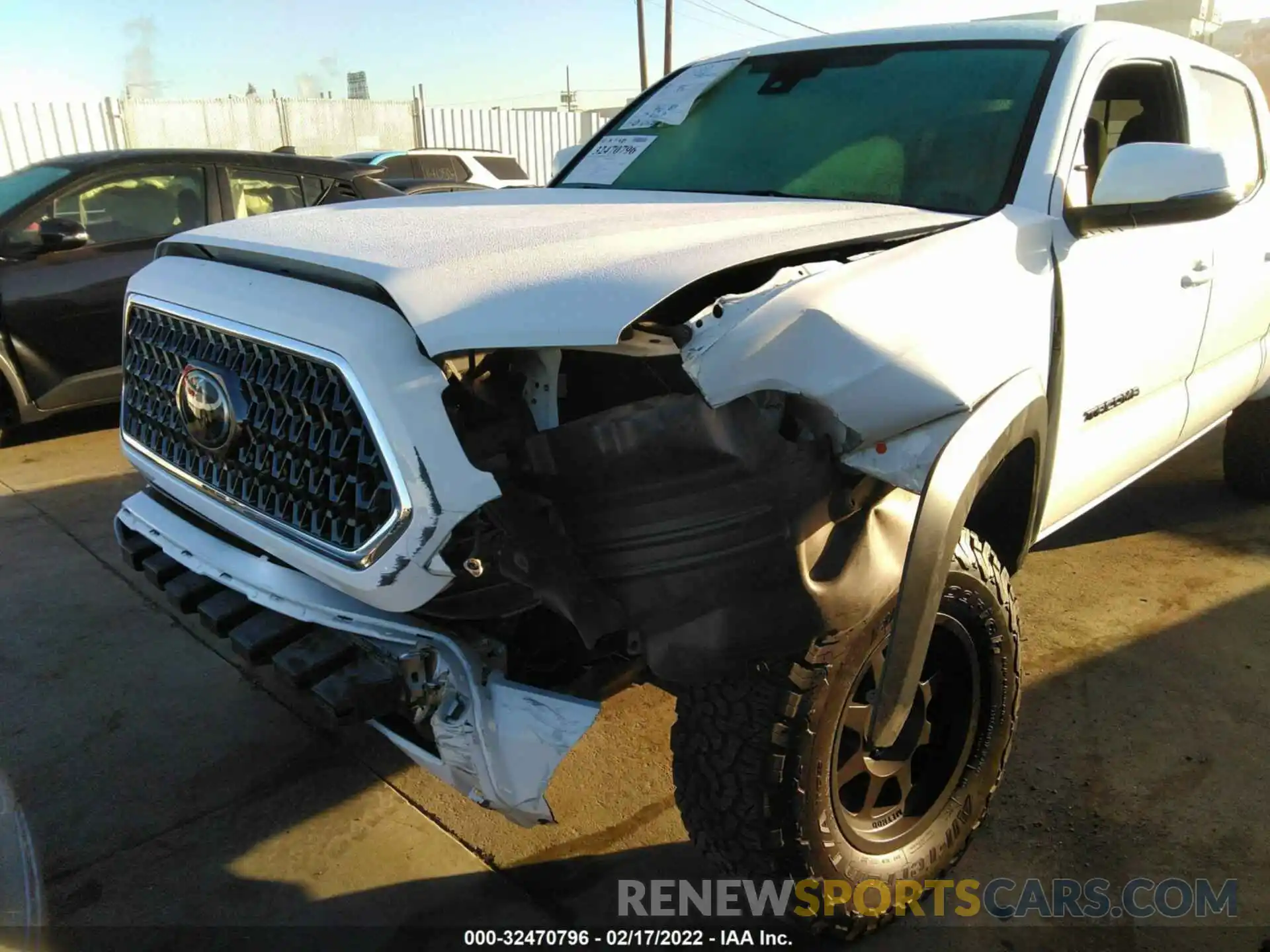 6 Photograph of a damaged car 3TMDZ5BN2KM061203 TOYOTA TACOMA 4WD 2019