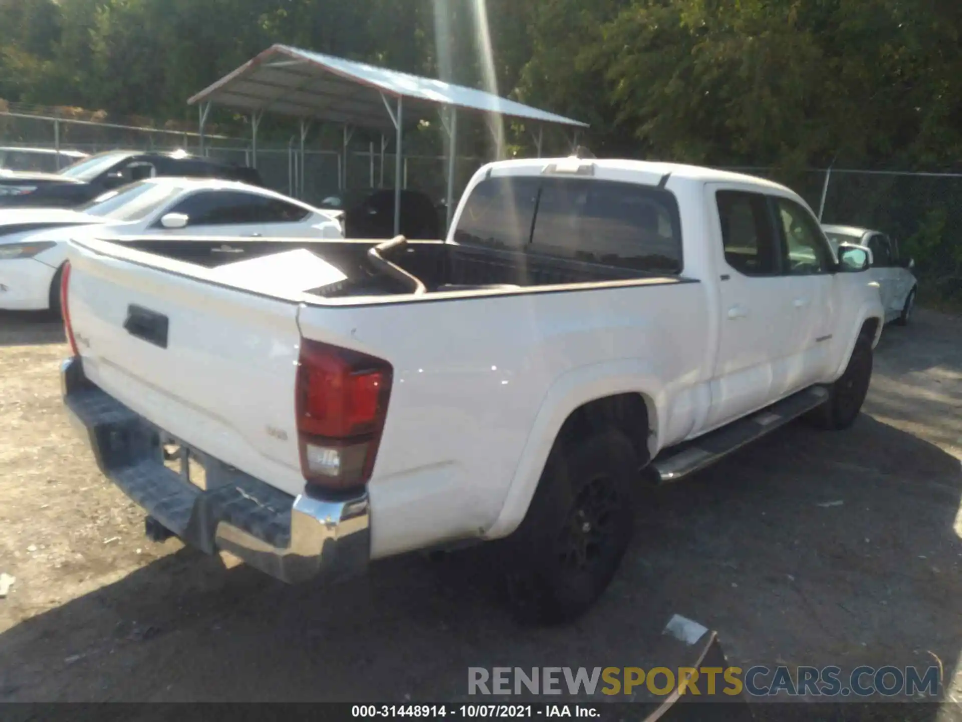 4 Photograph of a damaged car 3TMDZ5BN3KM060688 TOYOTA TACOMA 4WD 2019