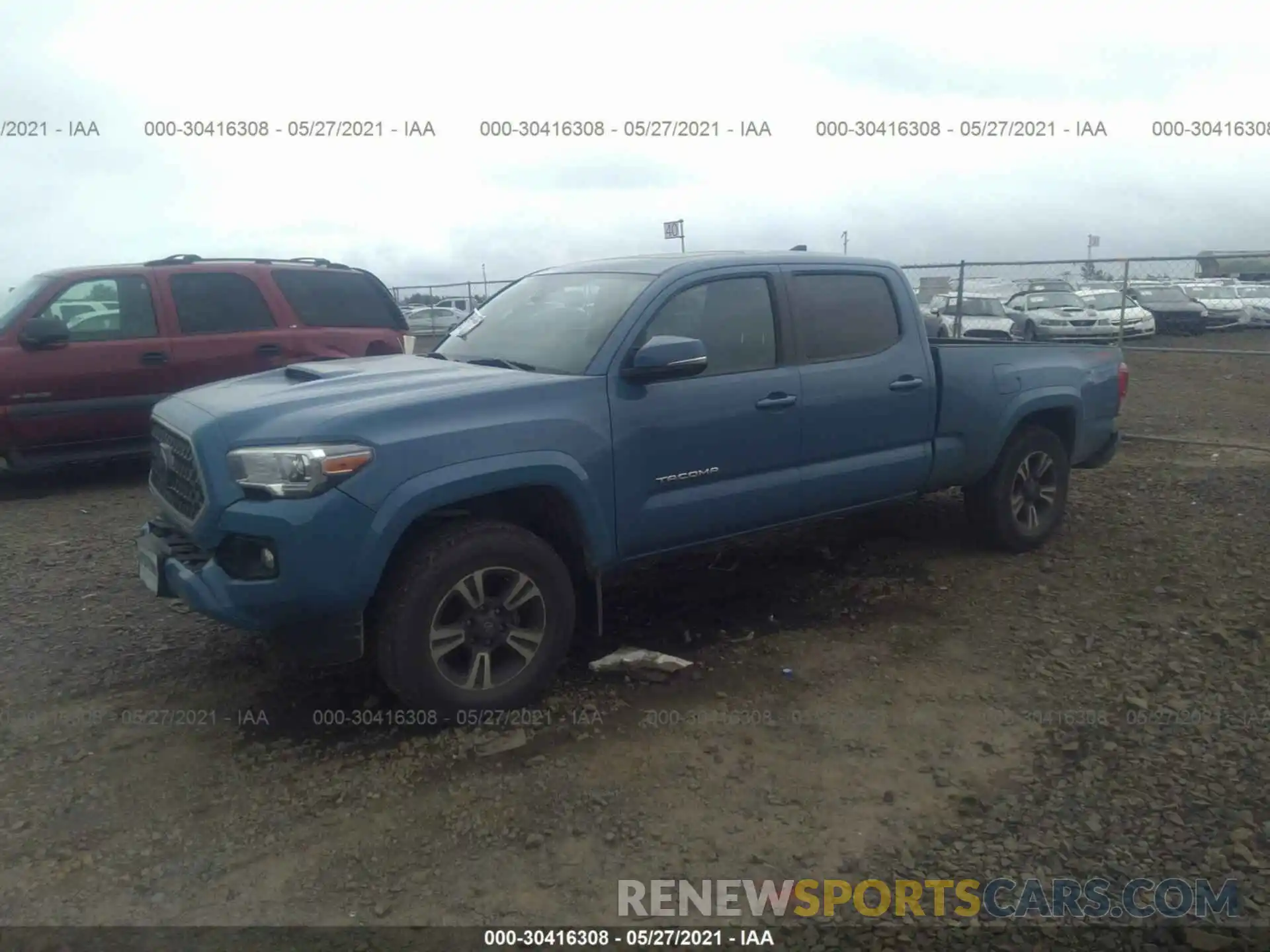 2 Photograph of a damaged car 3TMDZ5BN3KM063736 TOYOTA TACOMA 4WD 2019