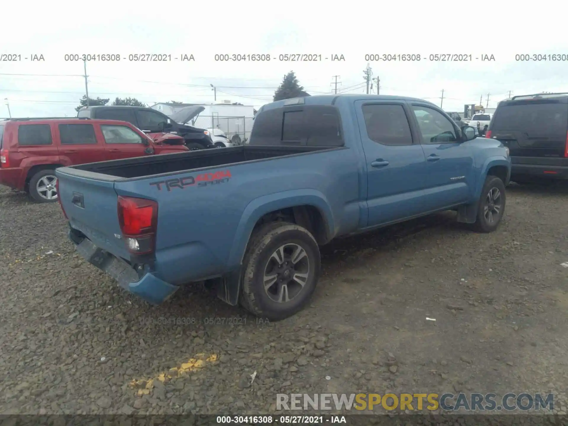 4 Photograph of a damaged car 3TMDZ5BN3KM063736 TOYOTA TACOMA 4WD 2019