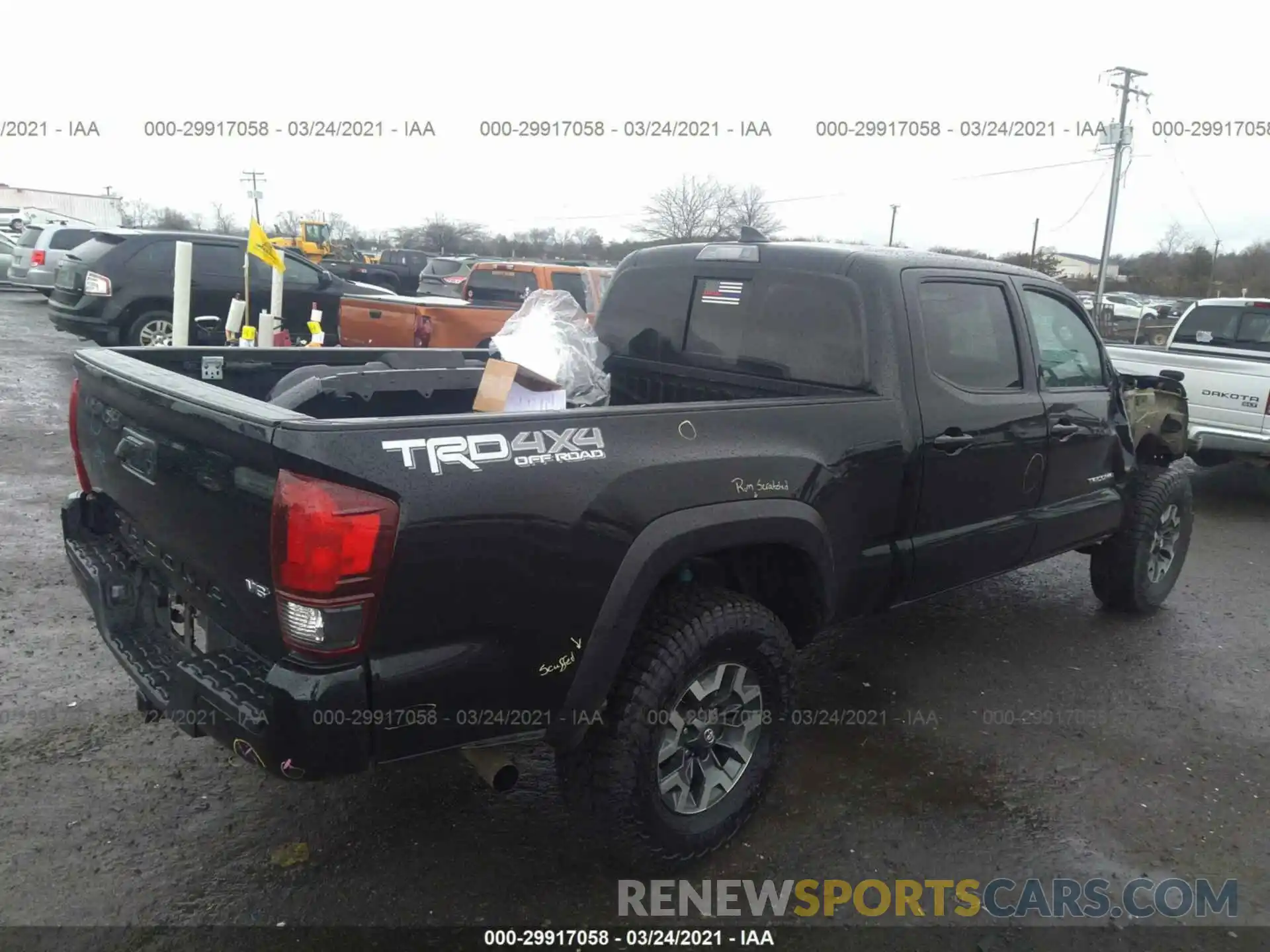 4 Photograph of a damaged car 3TMDZ5BN3KM066202 TOYOTA TACOMA 4WD 2019