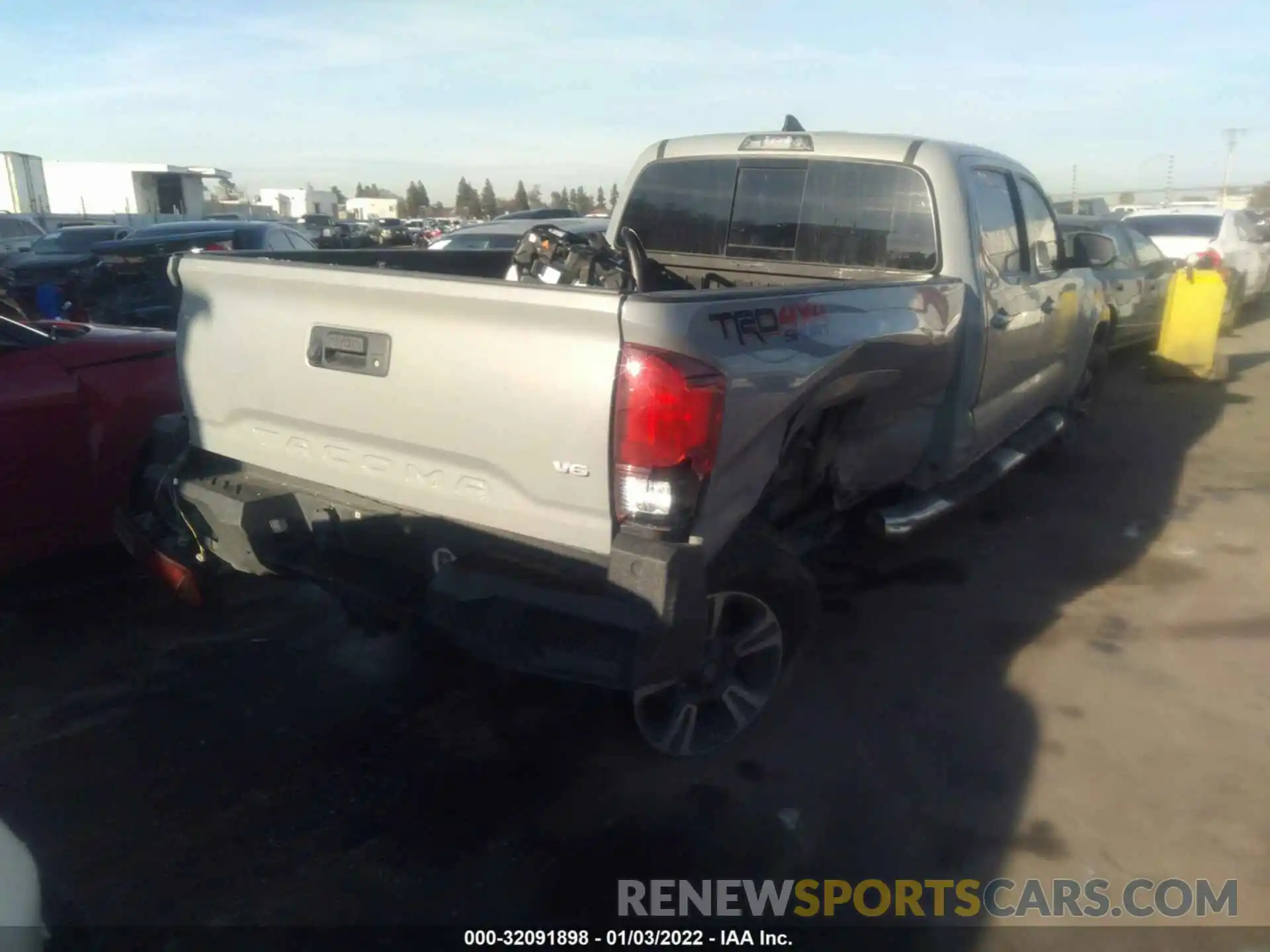 4 Photograph of a damaged car 3TMDZ5BN3KM070220 TOYOTA TACOMA 4WD 2019