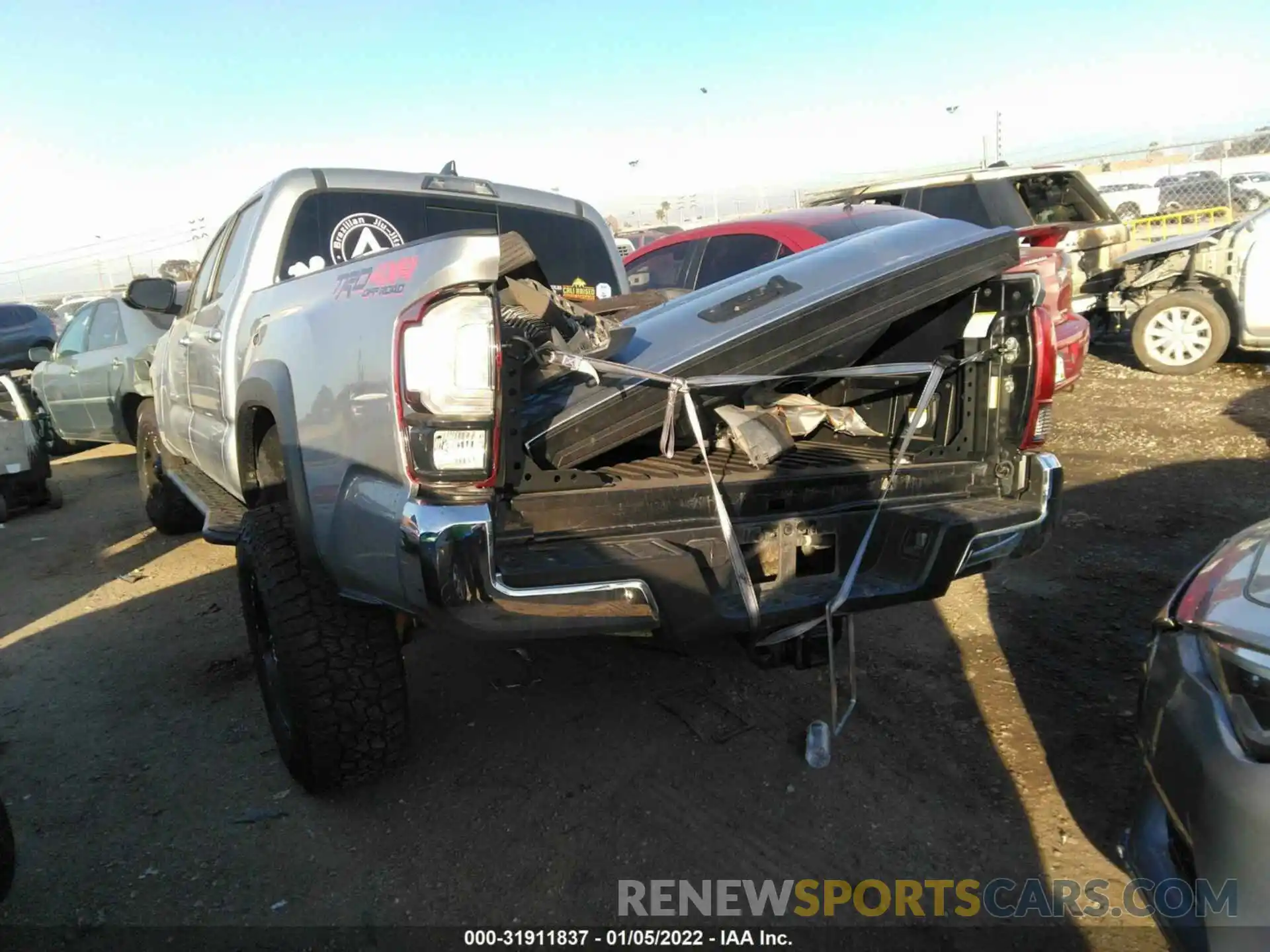 3 Photograph of a damaged car 3TMDZ5BN5KM057095 TOYOTA TACOMA 4WD 2019