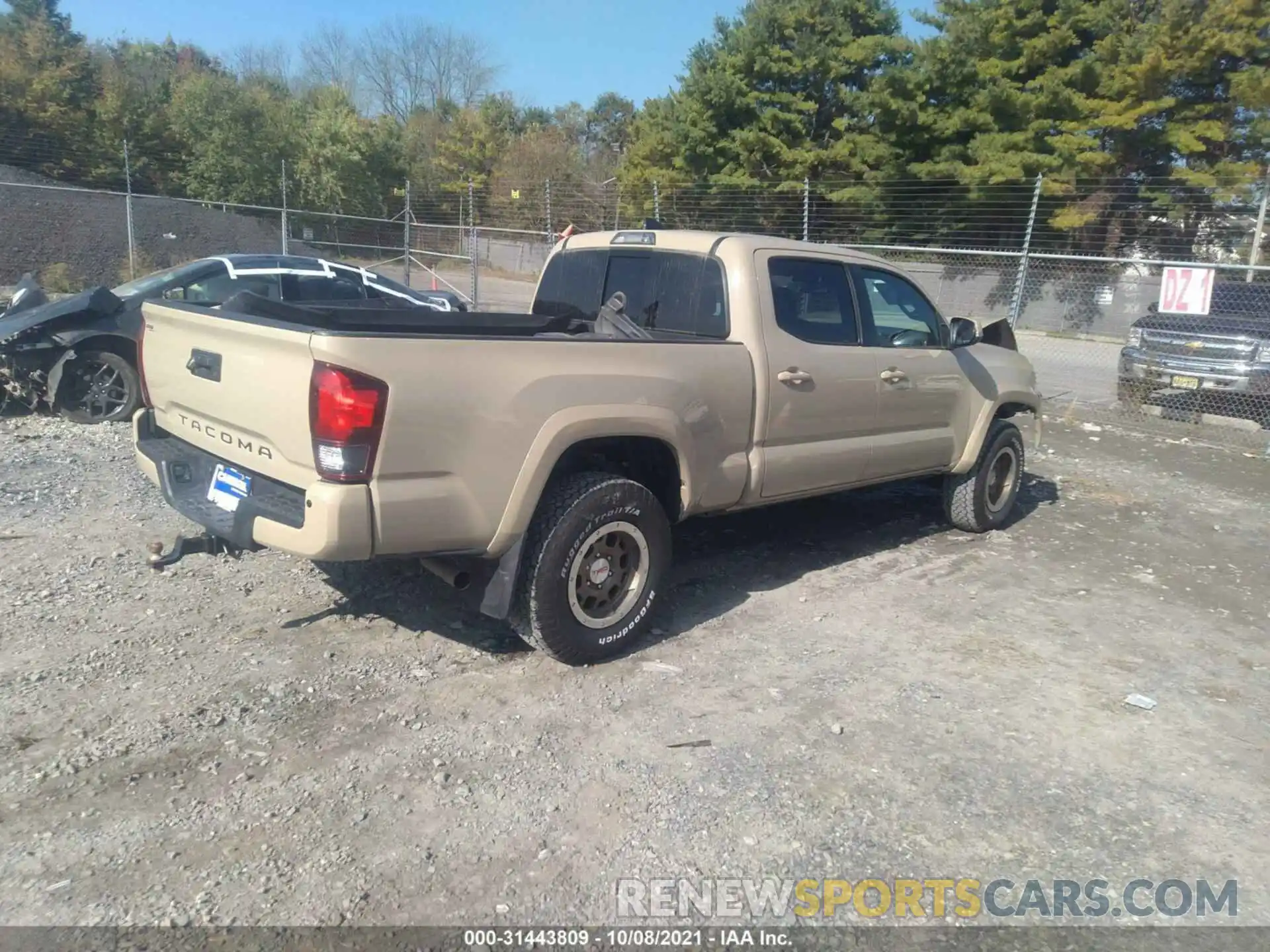 4 Photograph of a damaged car 3TMDZ5BN5KM066914 TOYOTA TACOMA 4WD 2019