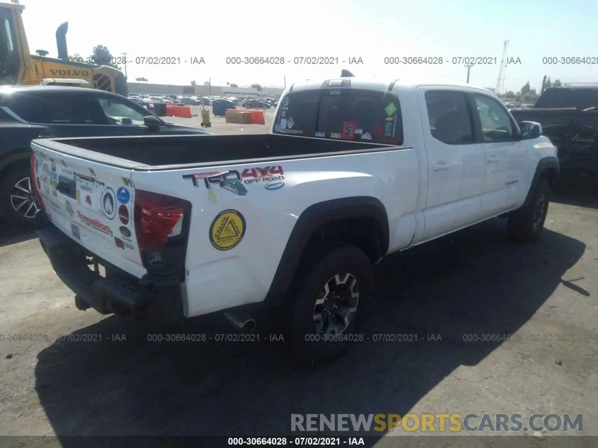 4 Photograph of a damaged car 3TMDZ5BN5KM071255 TOYOTA TACOMA 4WD 2019