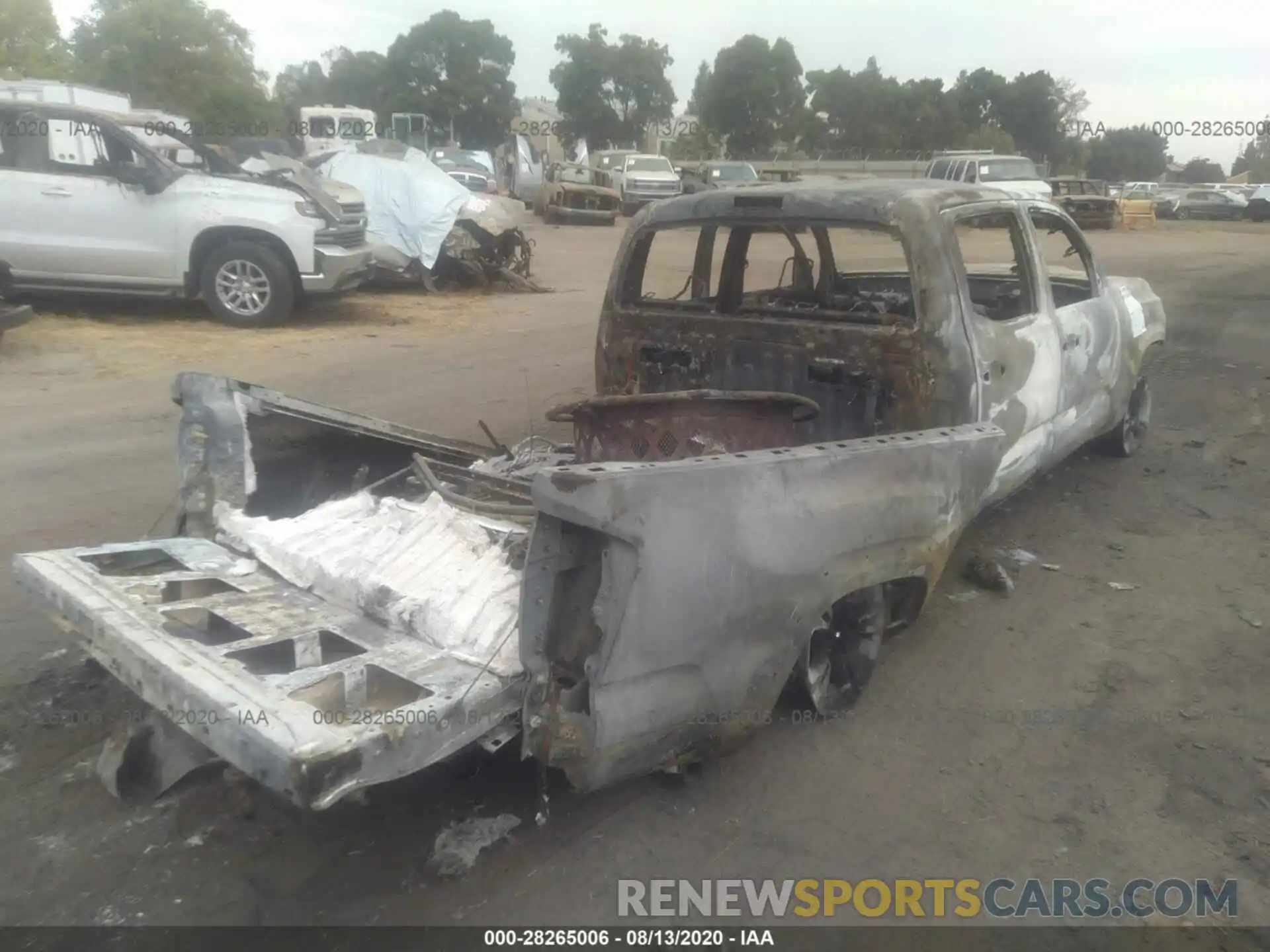 4 Photograph of a damaged car 3TMDZ5BN6KM055808 TOYOTA TACOMA 4WD 2019