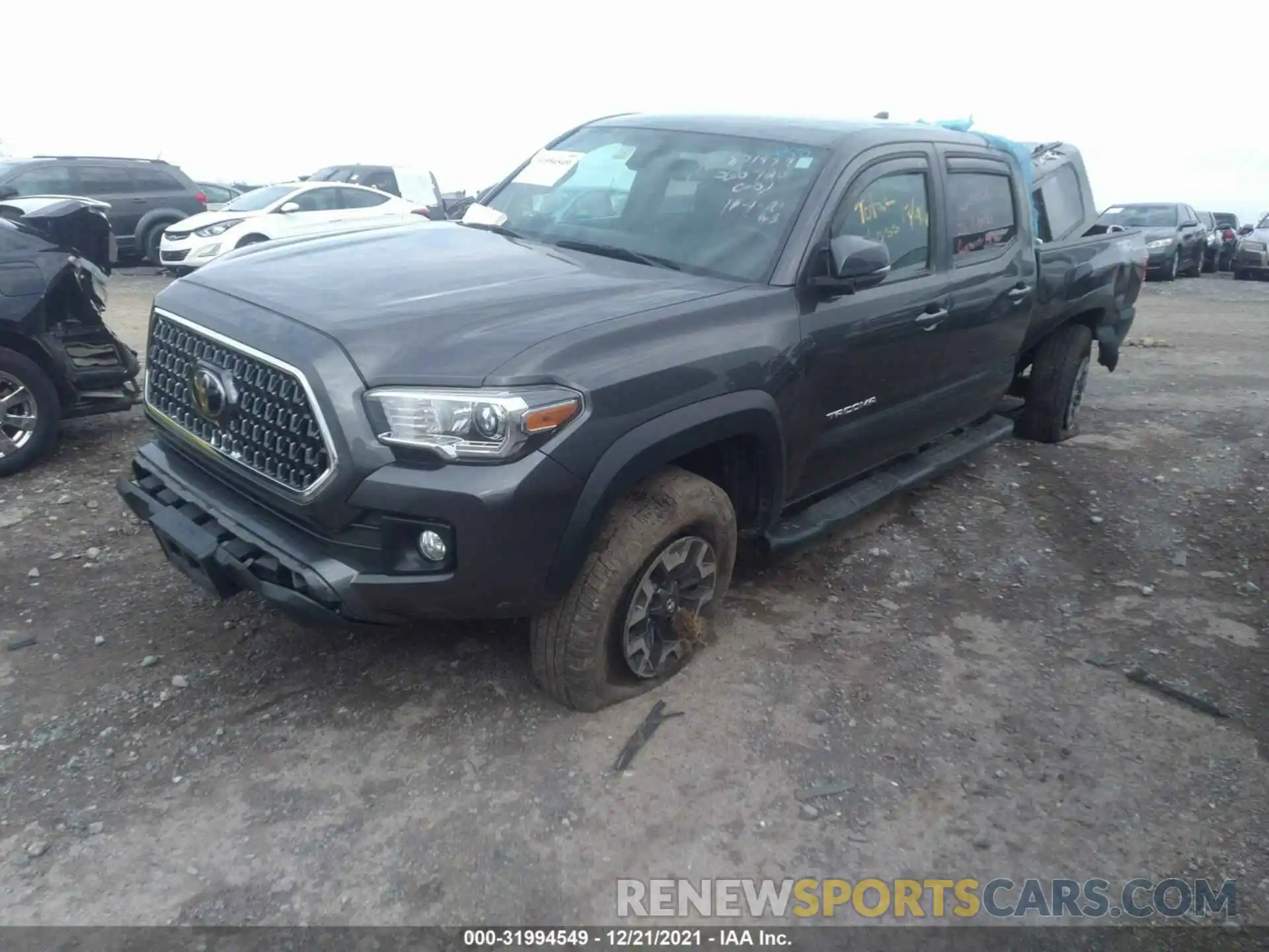 2 Photograph of a damaged car 3TMDZ5BN6KM060720 TOYOTA TACOMA 4WD 2019