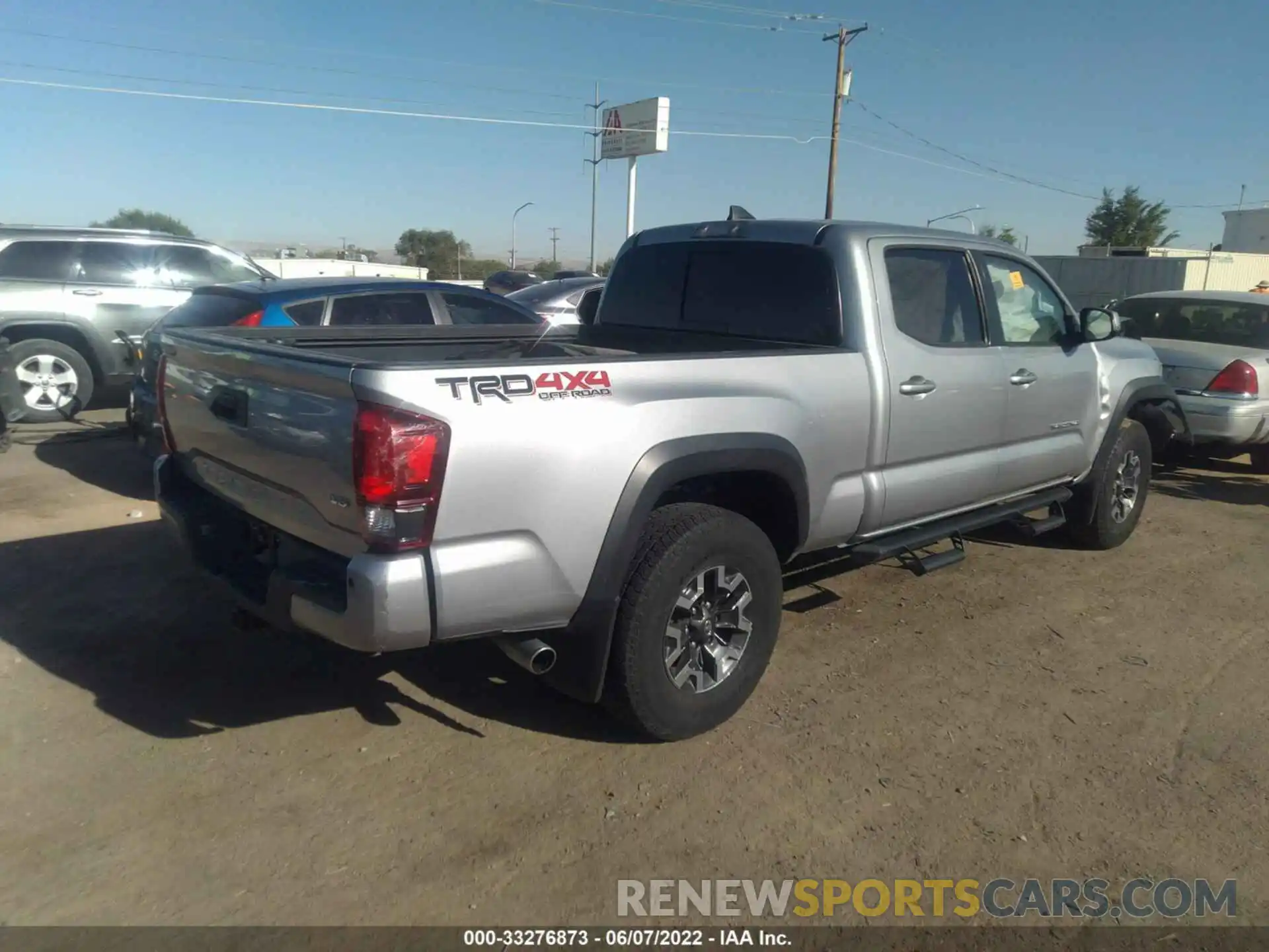 4 Photograph of a damaged car 3TMDZ5BN6KM072429 TOYOTA TACOMA 4WD 2019