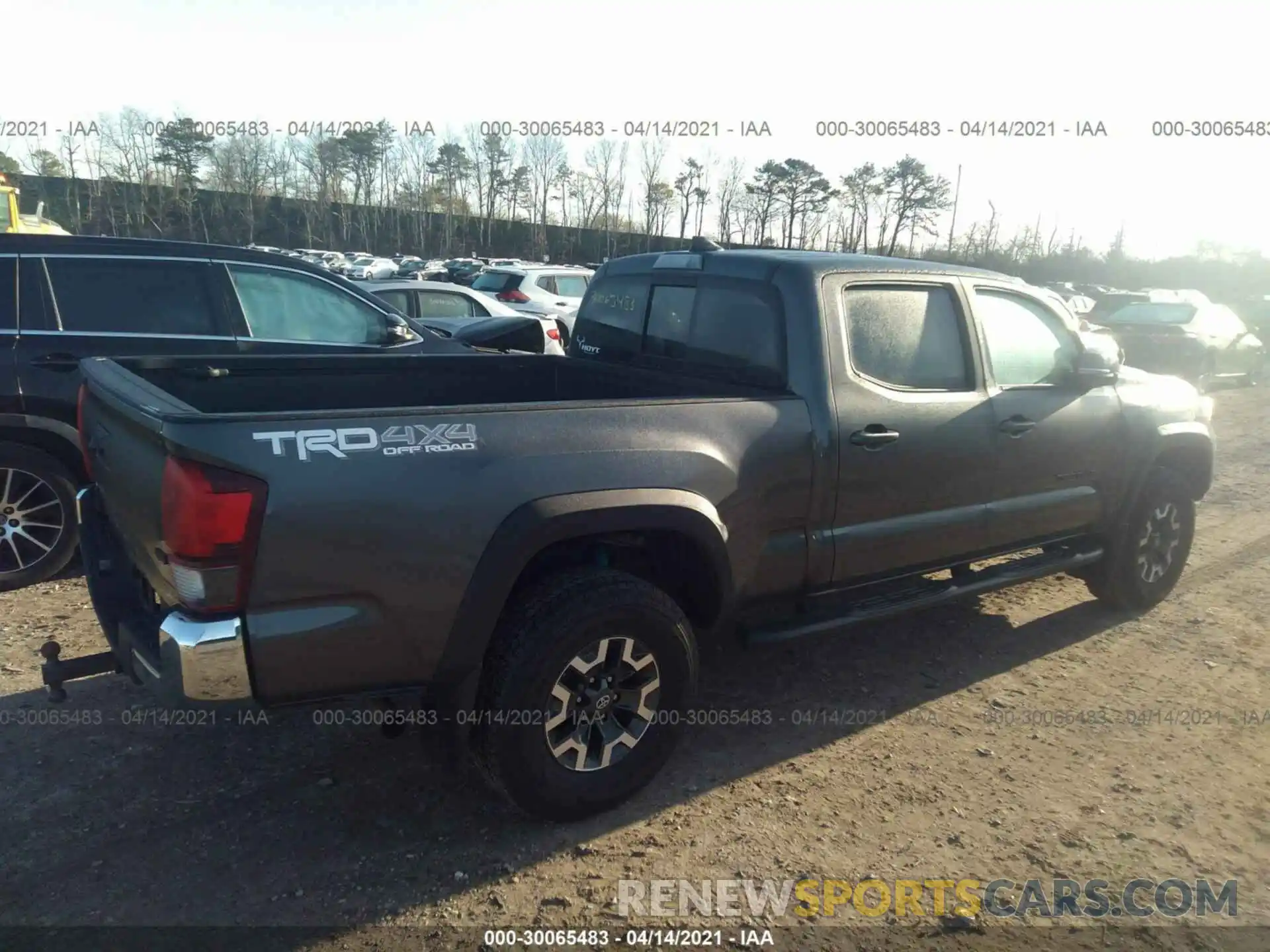 4 Photograph of a damaged car 3TMDZ5BN6KM074584 TOYOTA TACOMA 4WD 2019