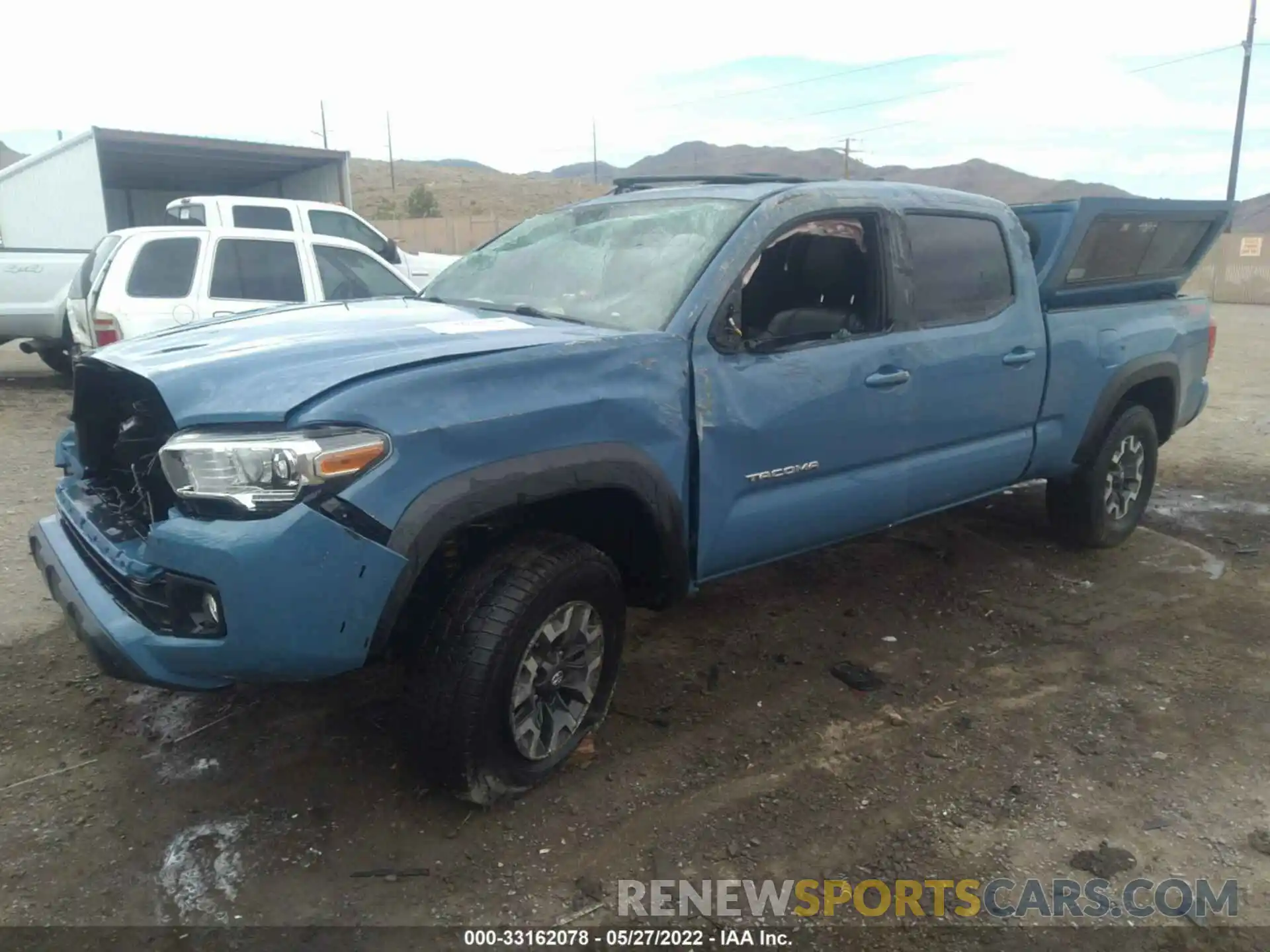 2 Photograph of a damaged car 3TMDZ5BN6KM077999 TOYOTA TACOMA 4WD 2019