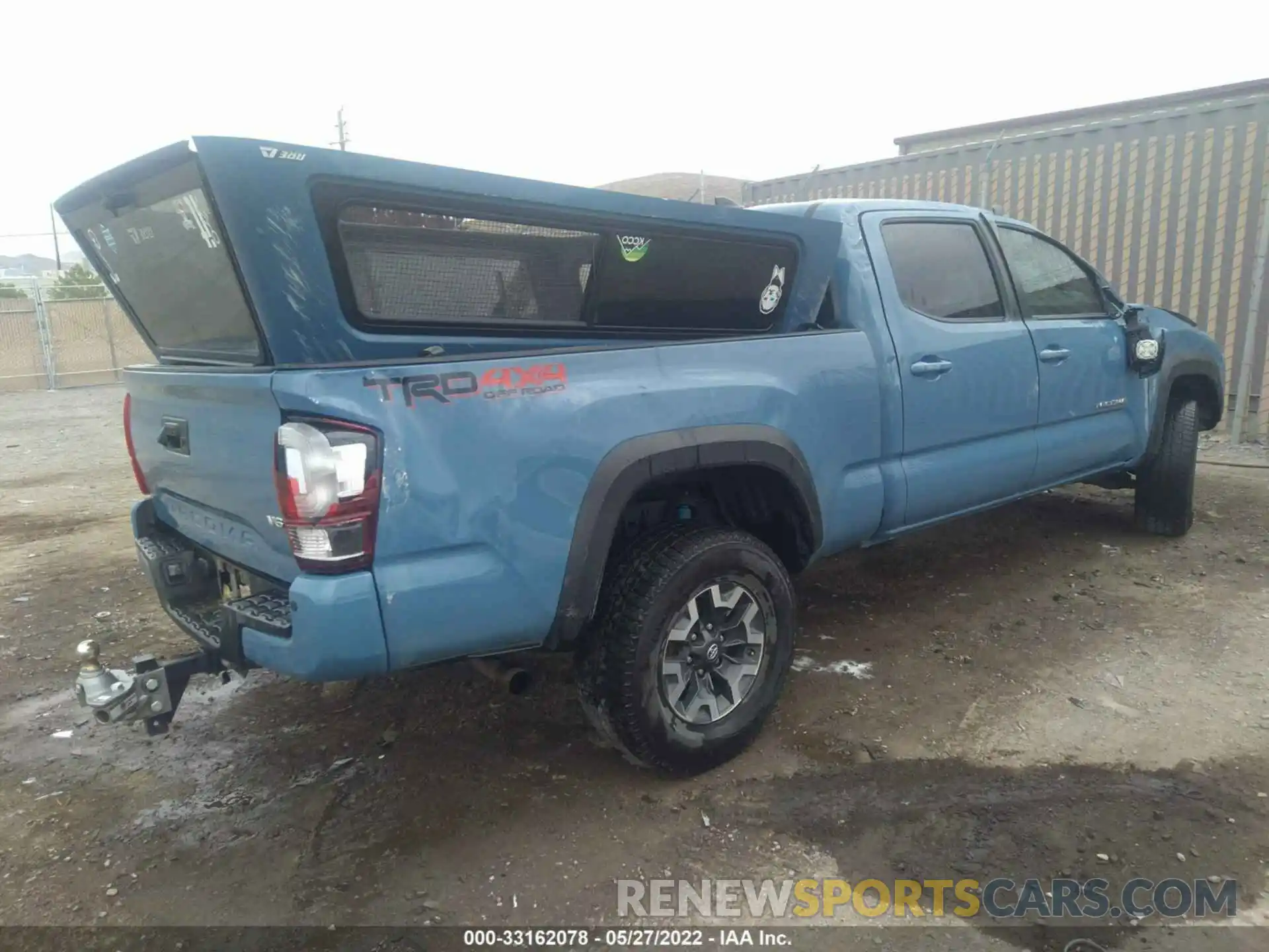 4 Photograph of a damaged car 3TMDZ5BN6KM077999 TOYOTA TACOMA 4WD 2019