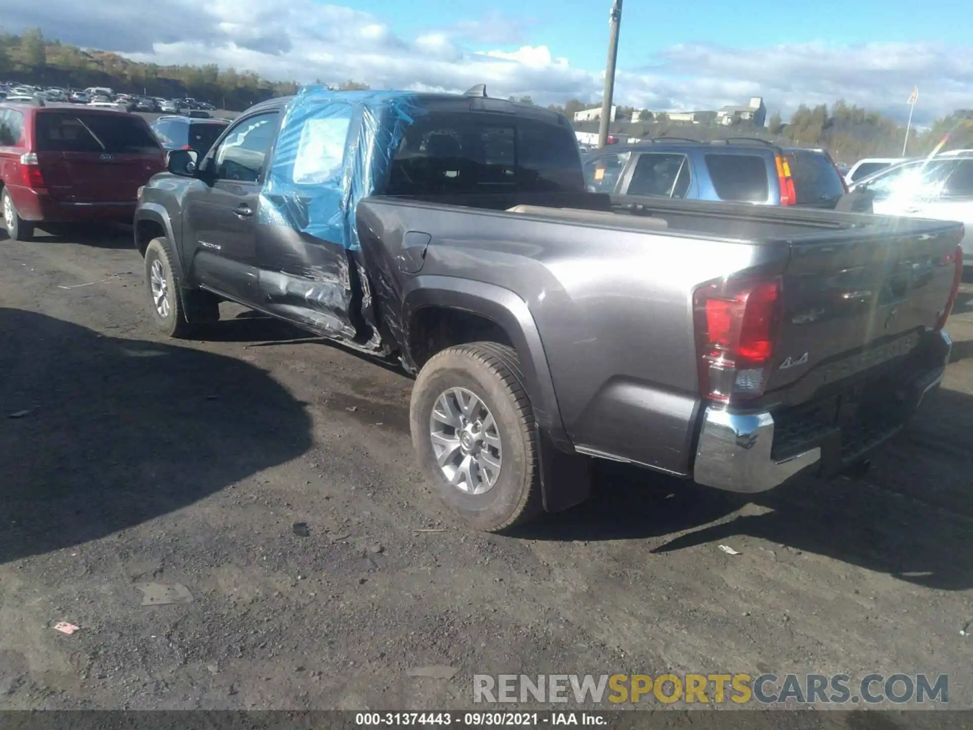 3 Photograph of a damaged car 3TMDZ5BN7KM058426 TOYOTA TACOMA 4WD 2019