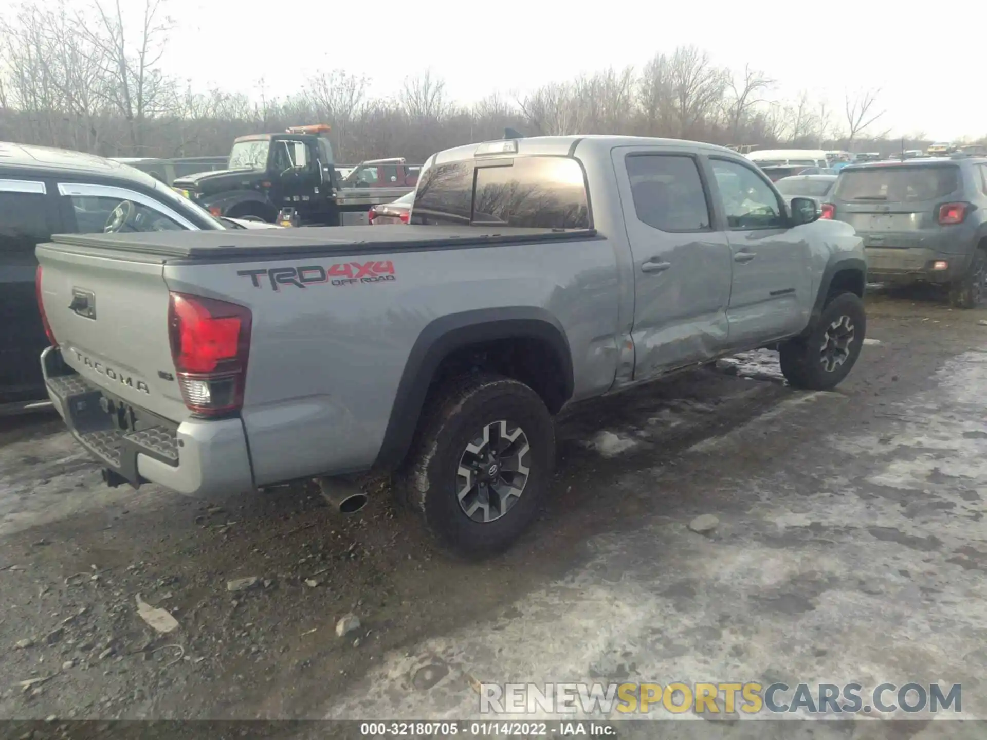 4 Photograph of a damaged car 3TMDZ5BN7KM065070 TOYOTA TACOMA 4WD 2019