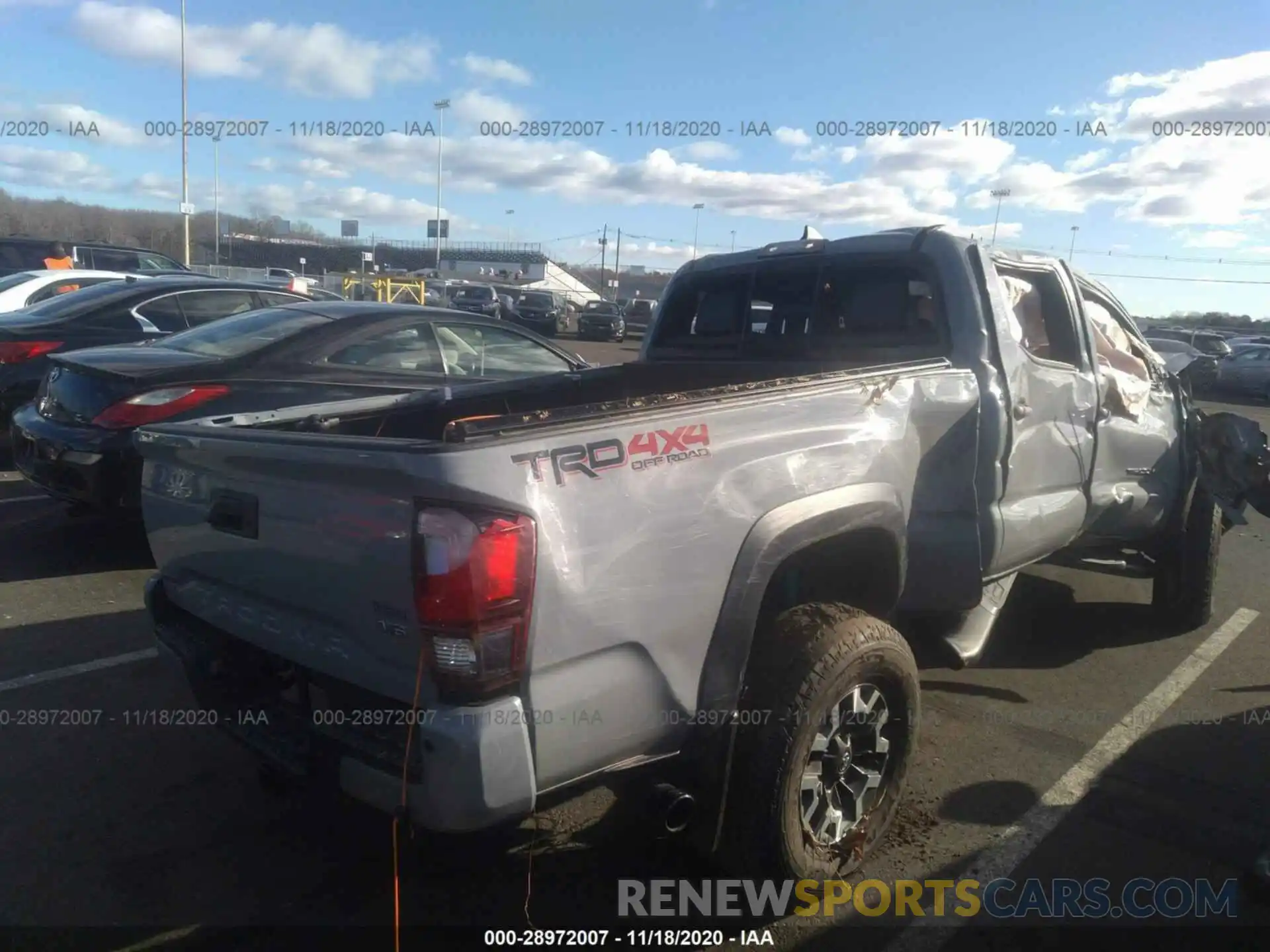 4 Photograph of a damaged car 3TMDZ5BN7KM073685 TOYOTA TACOMA 4WD 2019