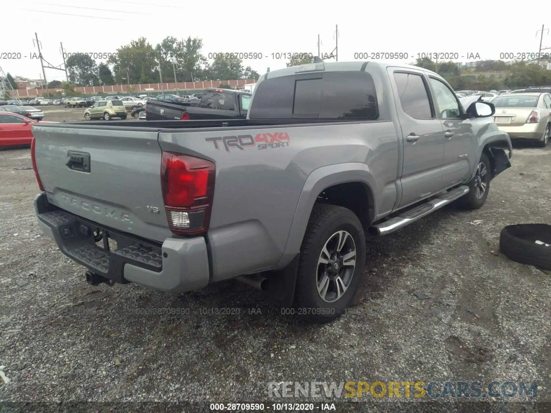 4 Photograph of a damaged car 3TMDZ5BN7KM076912 TOYOTA TACOMA 4WD 2019