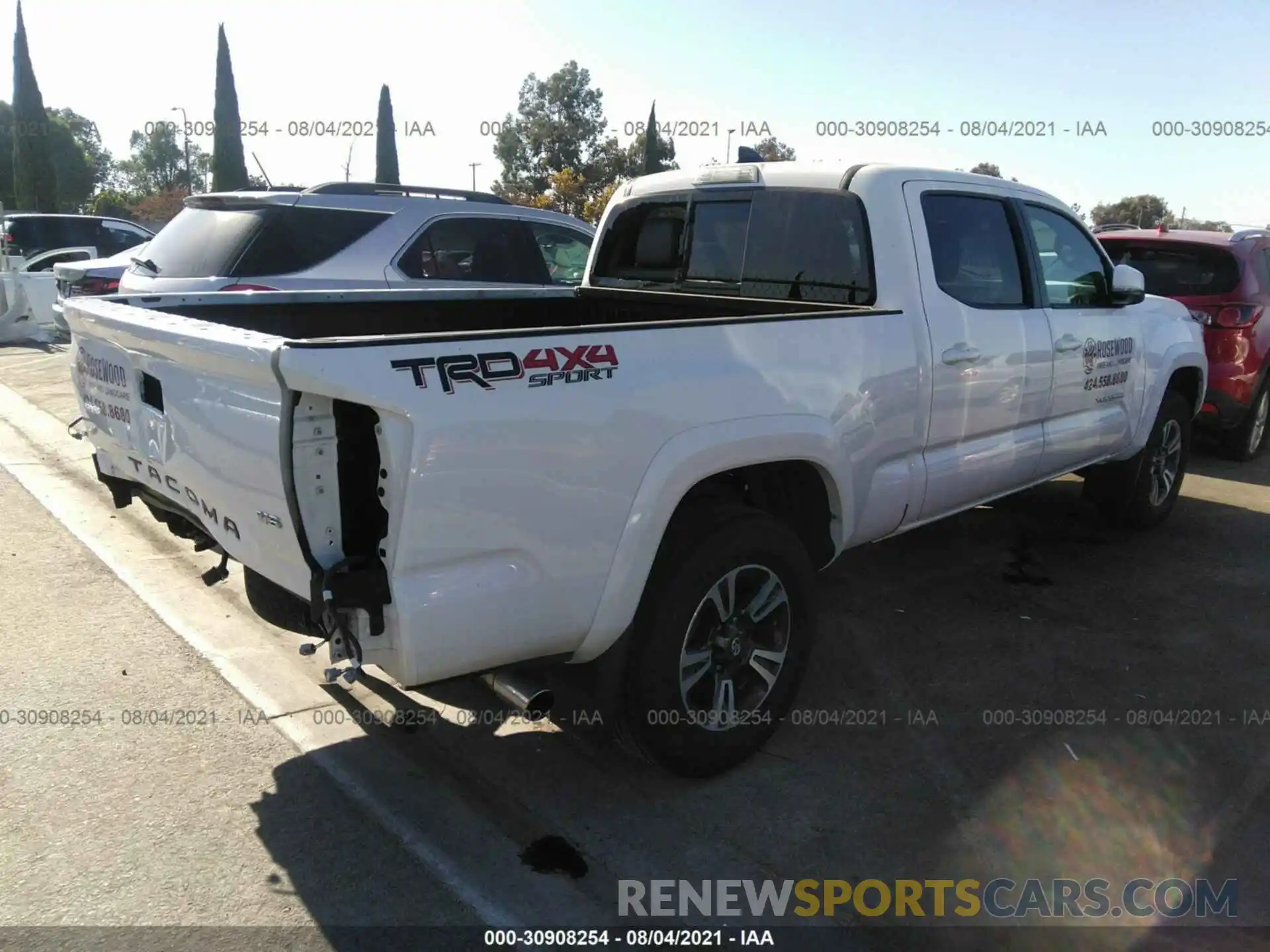 4 Photograph of a damaged car 3TMDZ5BN7KM078885 TOYOTA TACOMA 4WD 2019