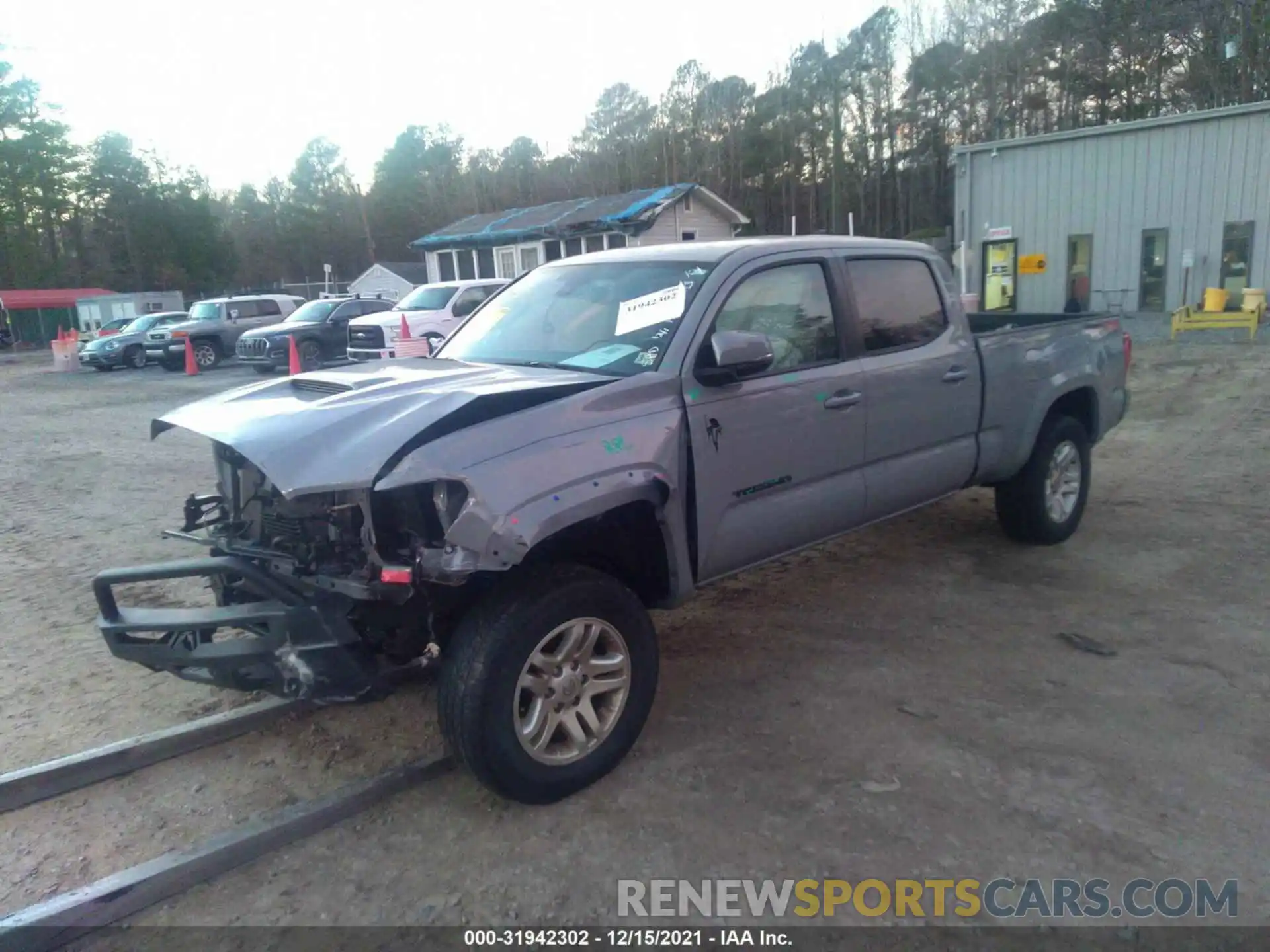 2 Photograph of a damaged car 3TMDZ5BN8KM063473 TOYOTA TACOMA 4WD 2019