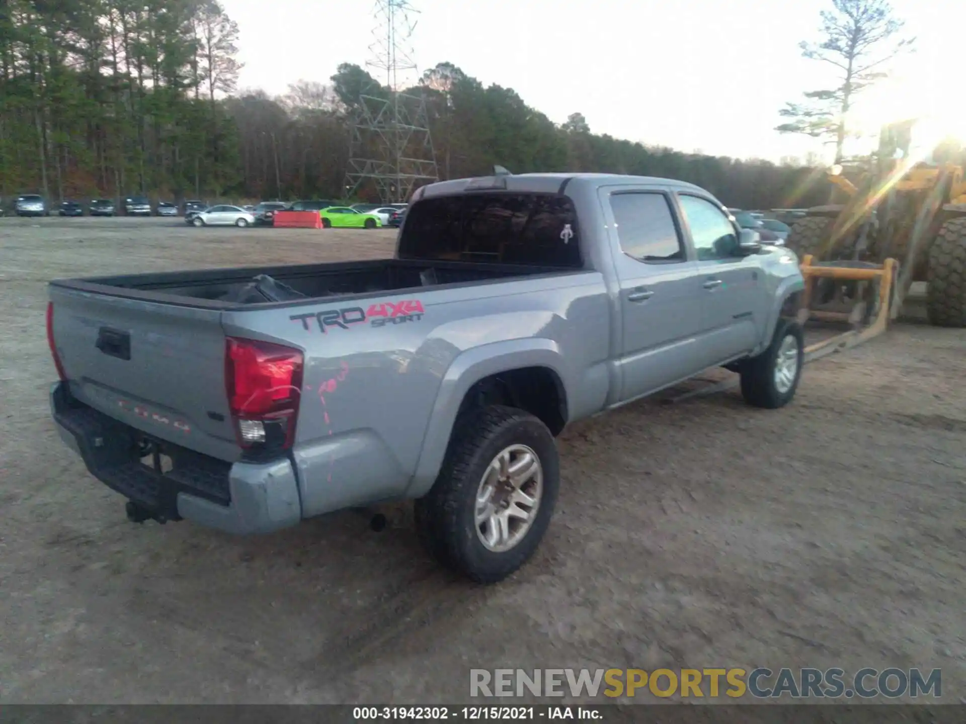 4 Photograph of a damaged car 3TMDZ5BN8KM063473 TOYOTA TACOMA 4WD 2019