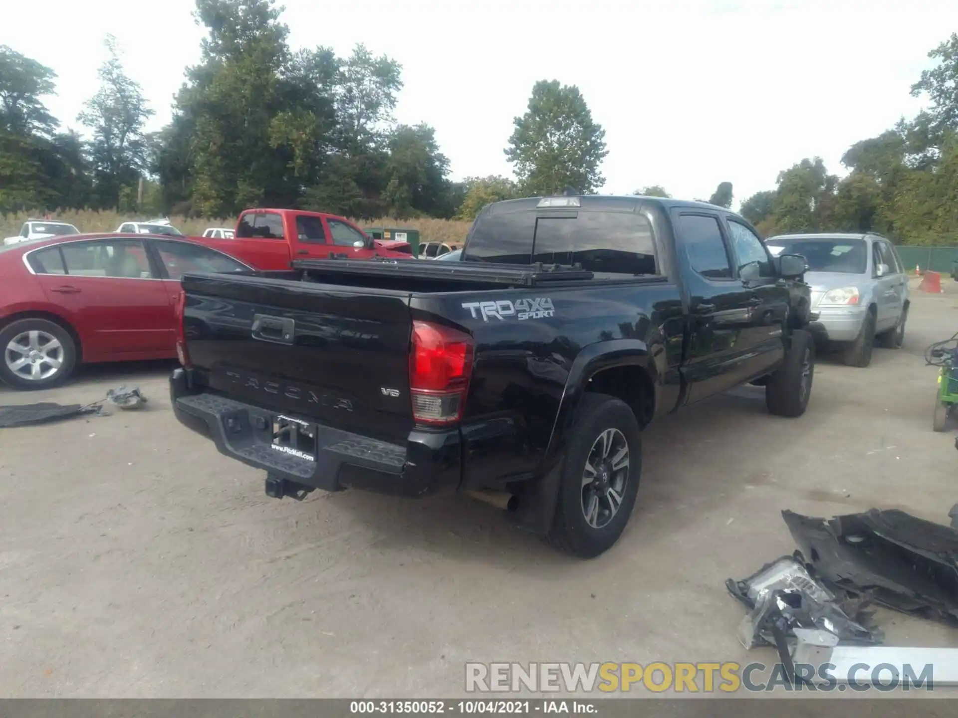 4 Photograph of a damaged car 3TMDZ5BN8KM068477 TOYOTA TACOMA 4WD 2019