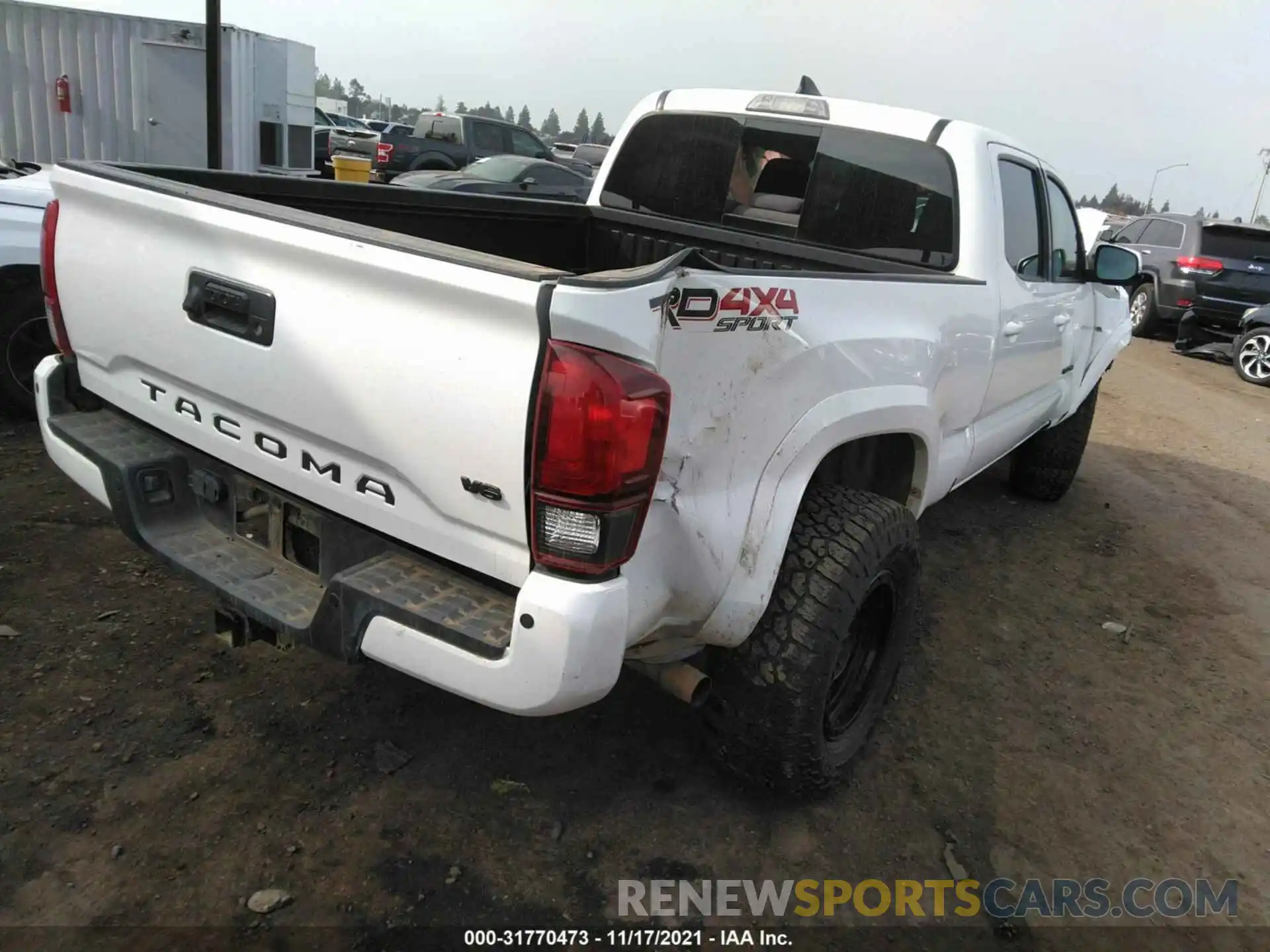 4 Photograph of a damaged car 3TMDZ5BN8KM069855 TOYOTA TACOMA 4WD 2019