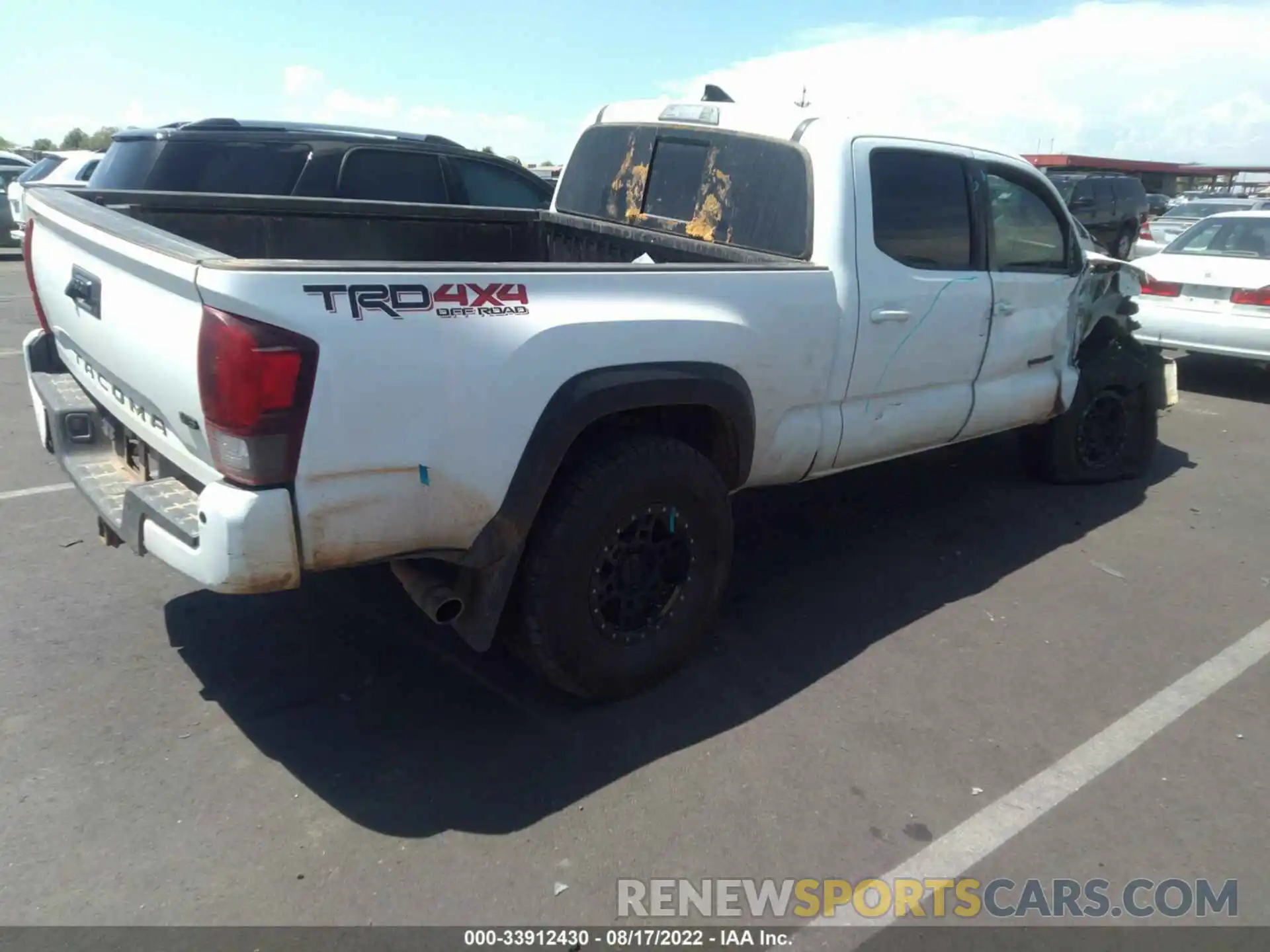 4 Photograph of a damaged car 3TMDZ5BN8KM072237 TOYOTA TACOMA 4WD 2019