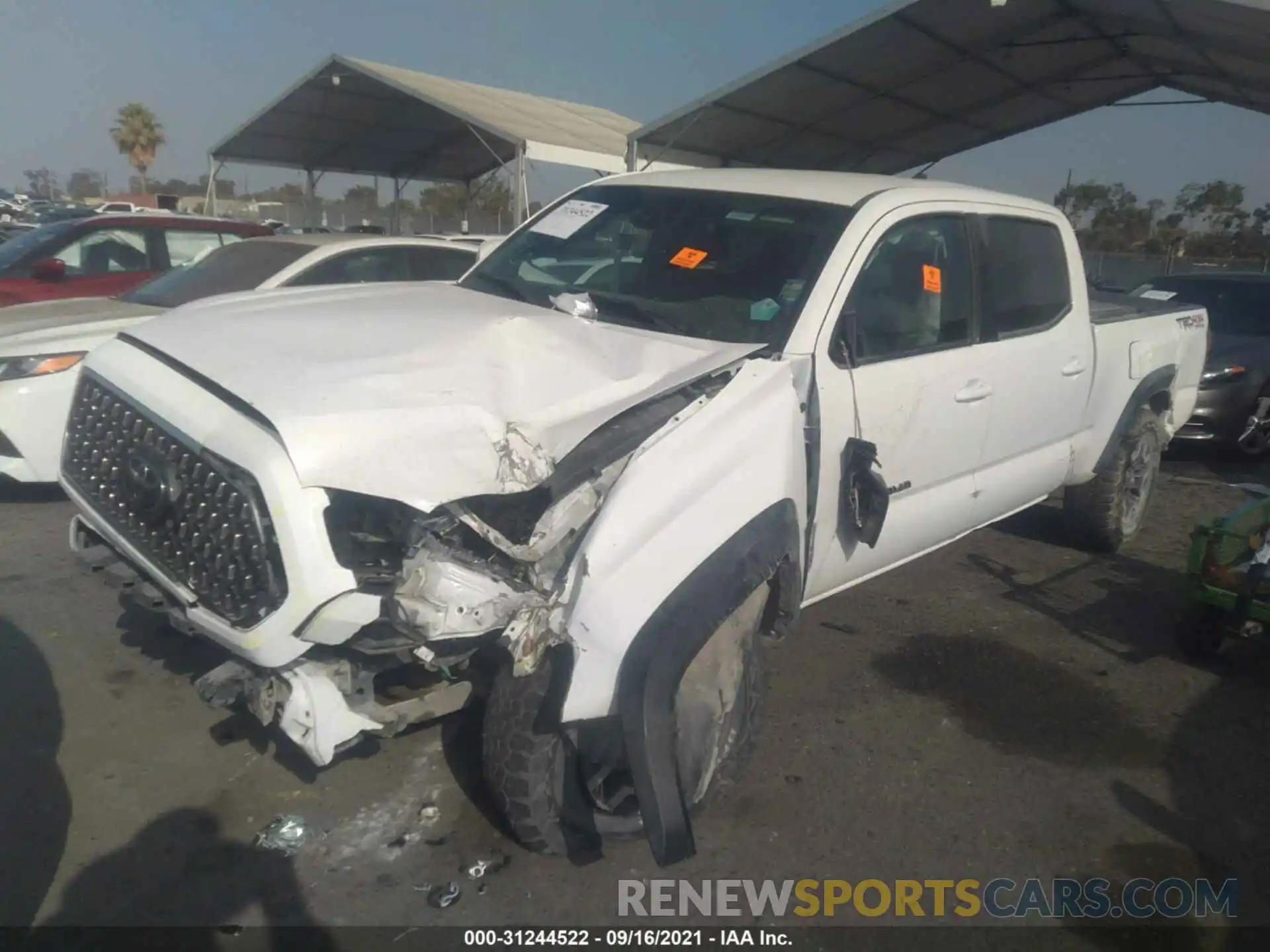 2 Photograph of a damaged car 3TMDZ5BN9KM055883 TOYOTA TACOMA 4WD 2019