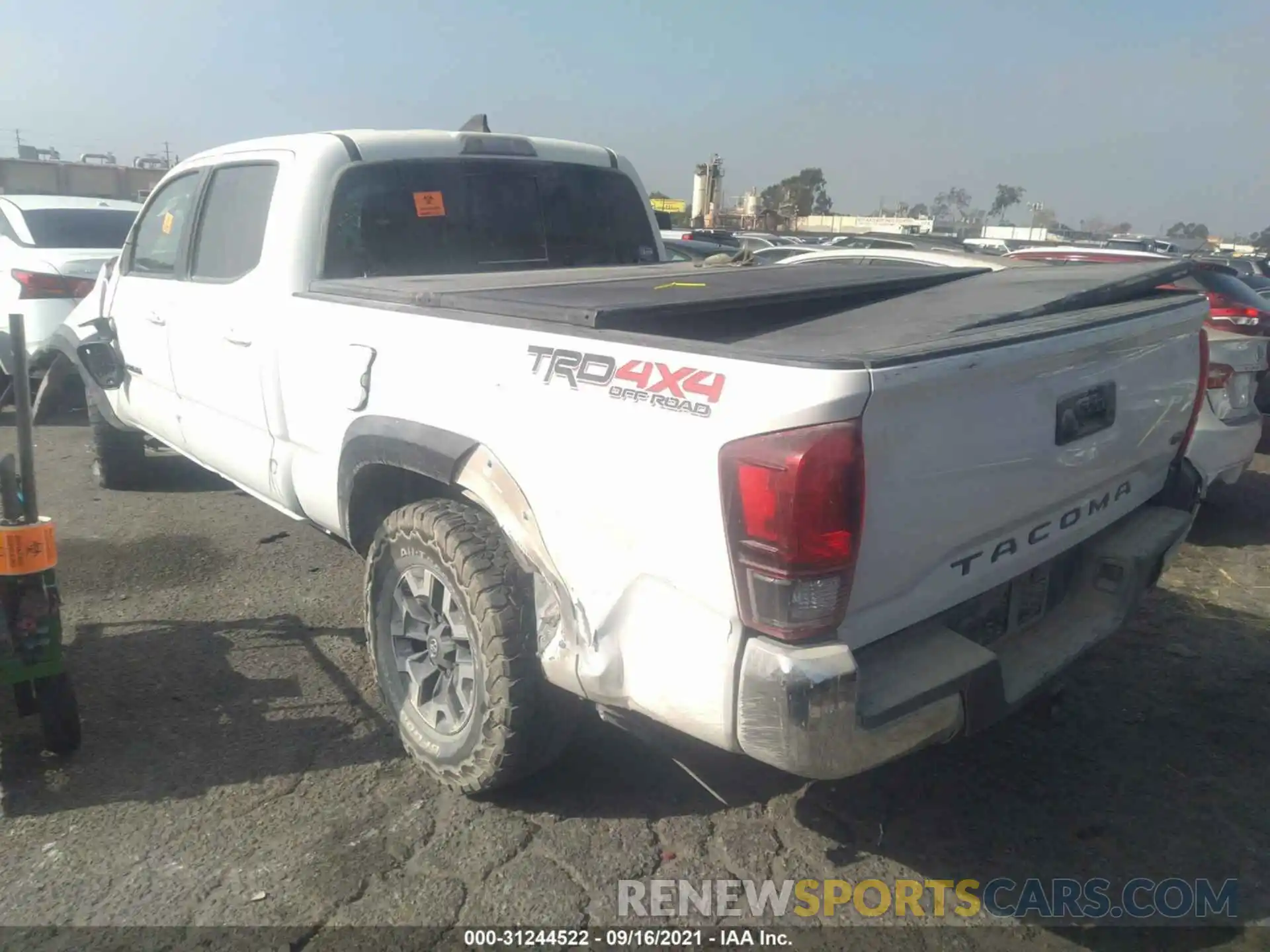 3 Photograph of a damaged car 3TMDZ5BN9KM055883 TOYOTA TACOMA 4WD 2019