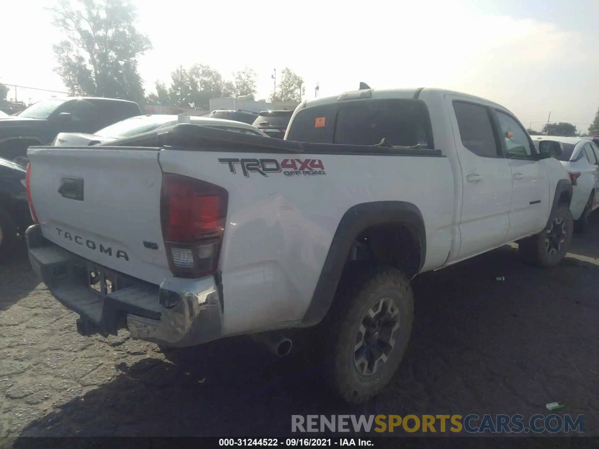 4 Photograph of a damaged car 3TMDZ5BN9KM055883 TOYOTA TACOMA 4WD 2019