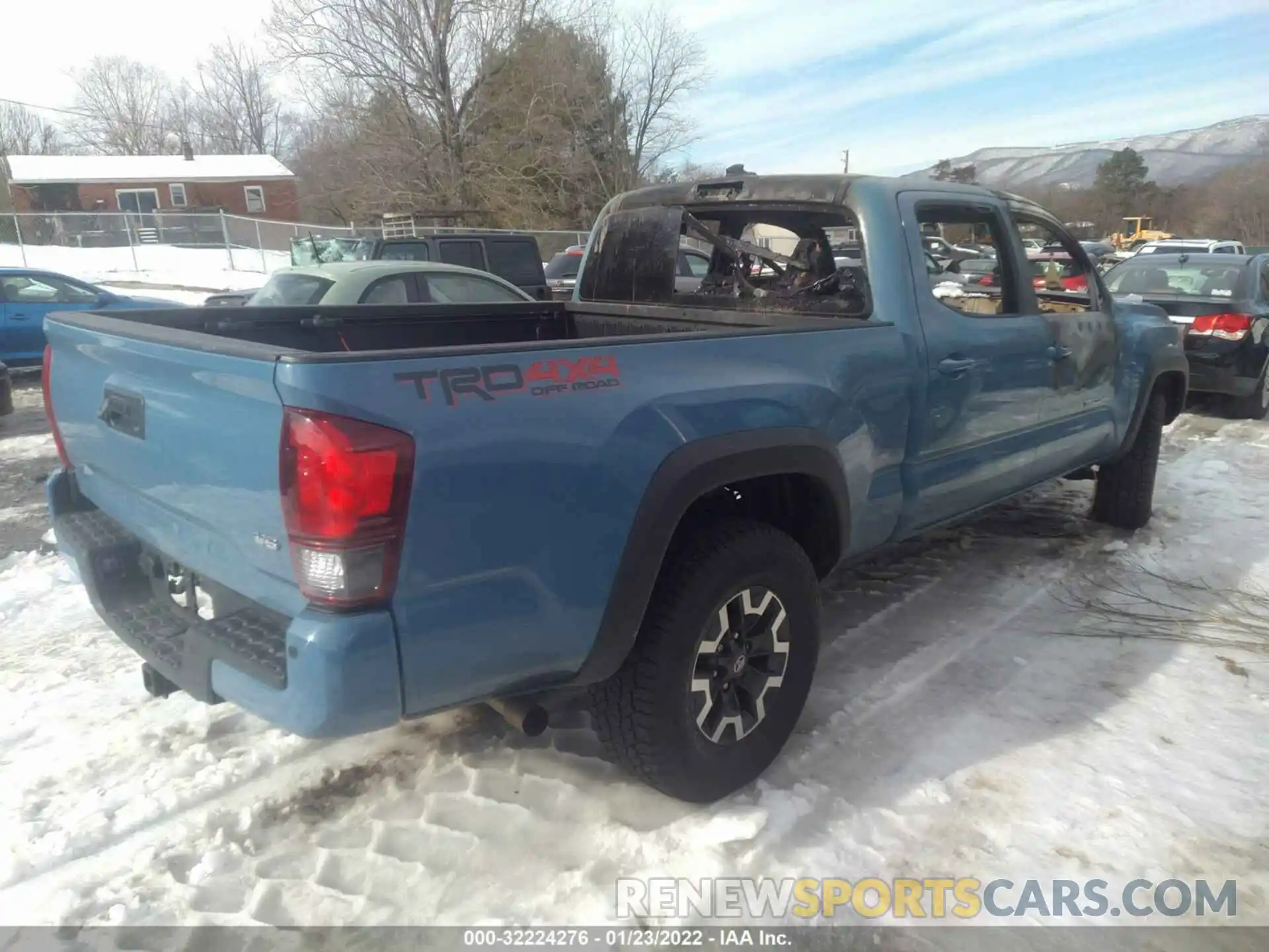 4 Photograph of a damaged car 3TMDZ5BN9KM055978 TOYOTA TACOMA 4WD 2019