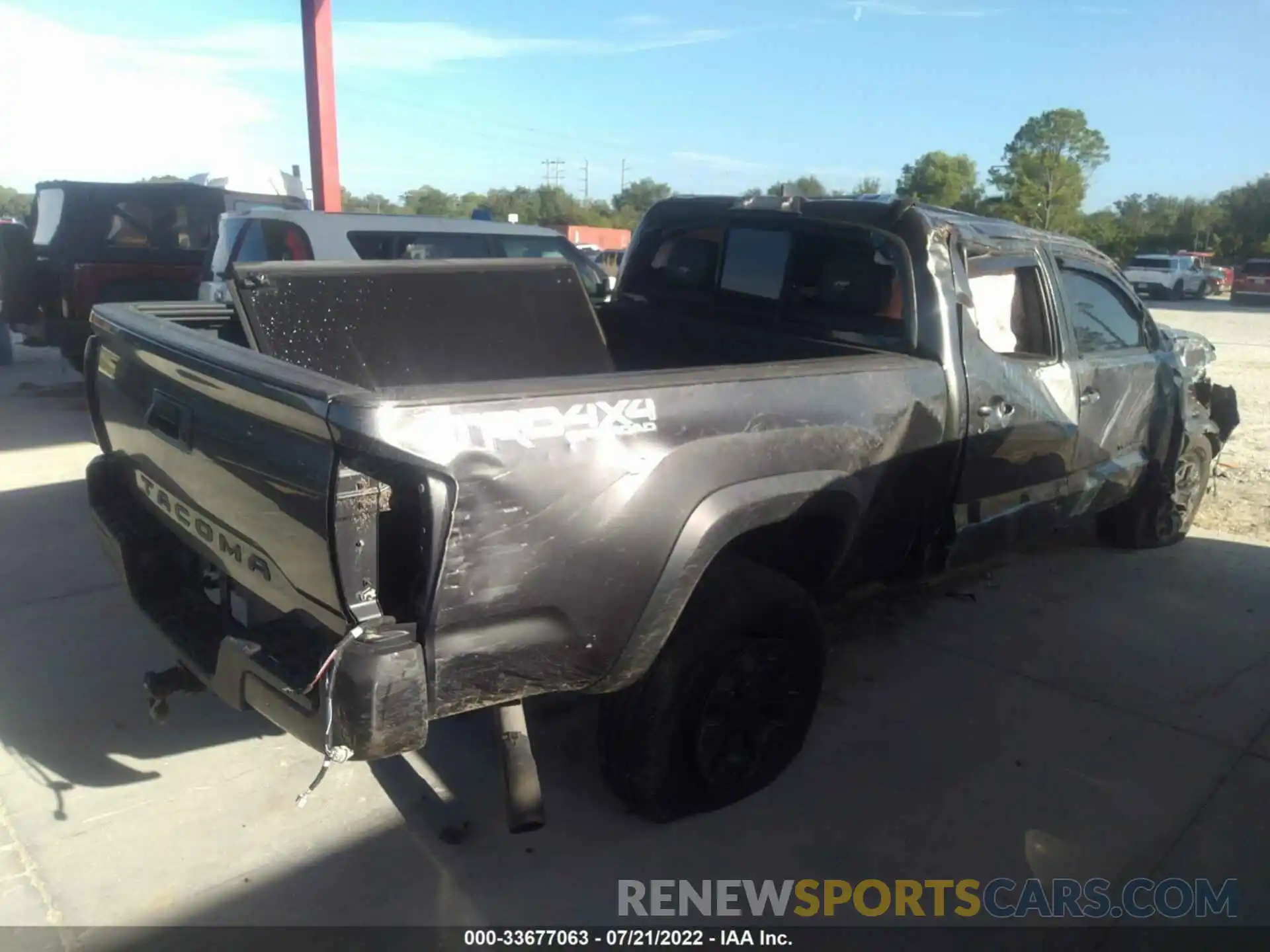 4 Photograph of a damaged car 3TMDZ5BN9KM067936 TOYOTA TACOMA 4WD 2019