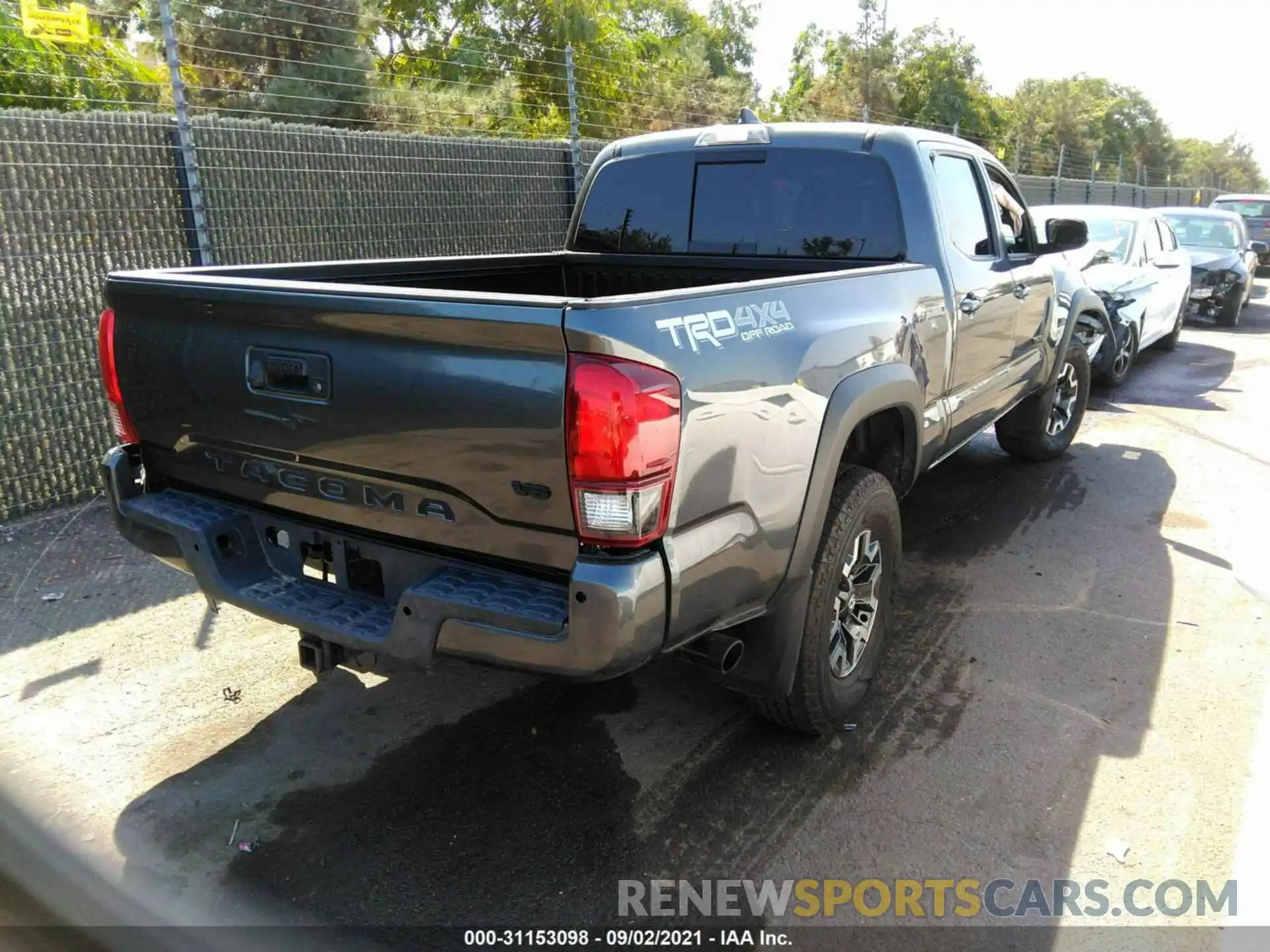 4 Photograph of a damaged car 3TMDZ5BN9KM072182 TOYOTA TACOMA 4WD 2019