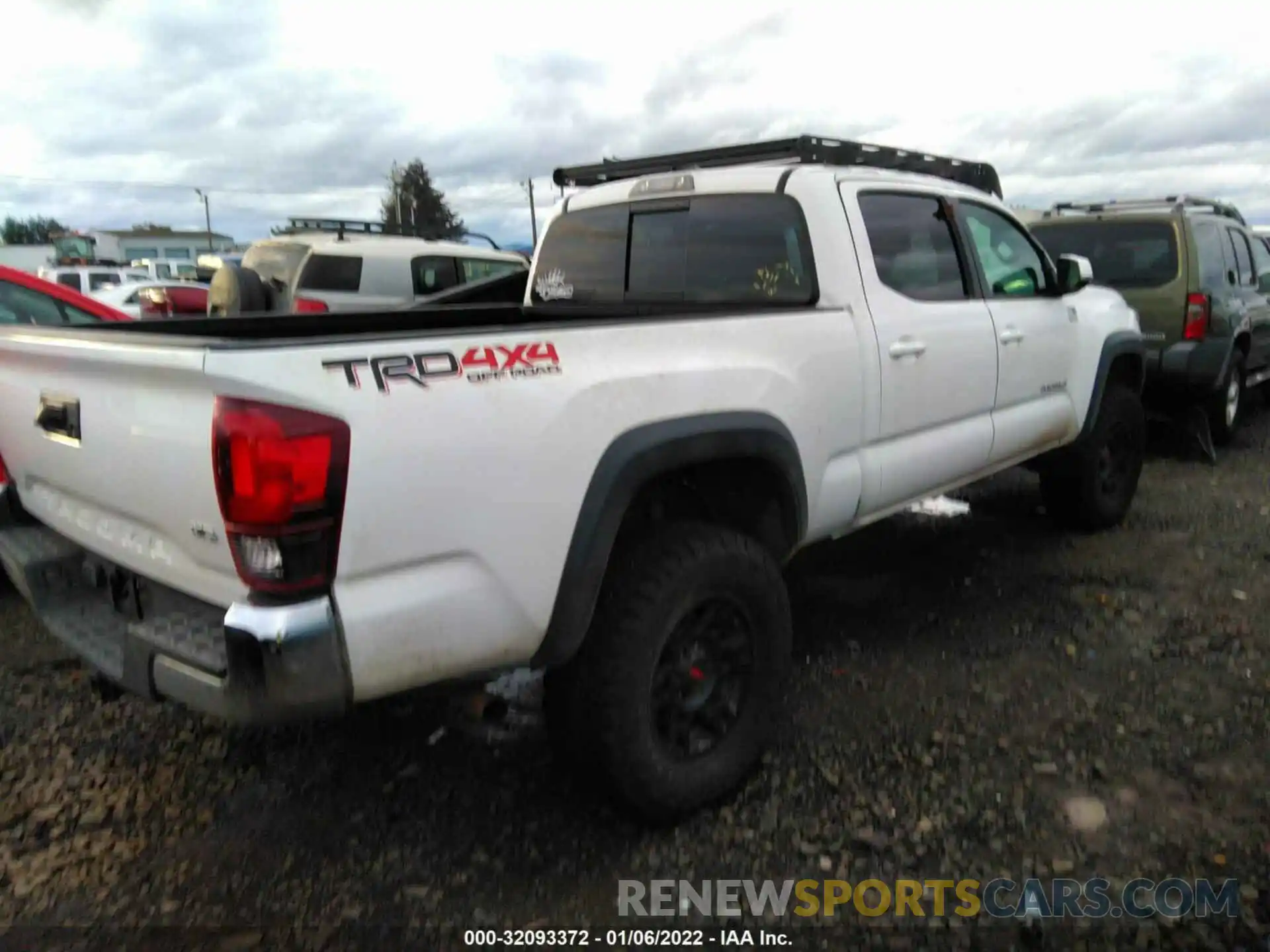 4 Photograph of a damaged car 3TMDZ5BN9KM079147 TOYOTA TACOMA 4WD 2019