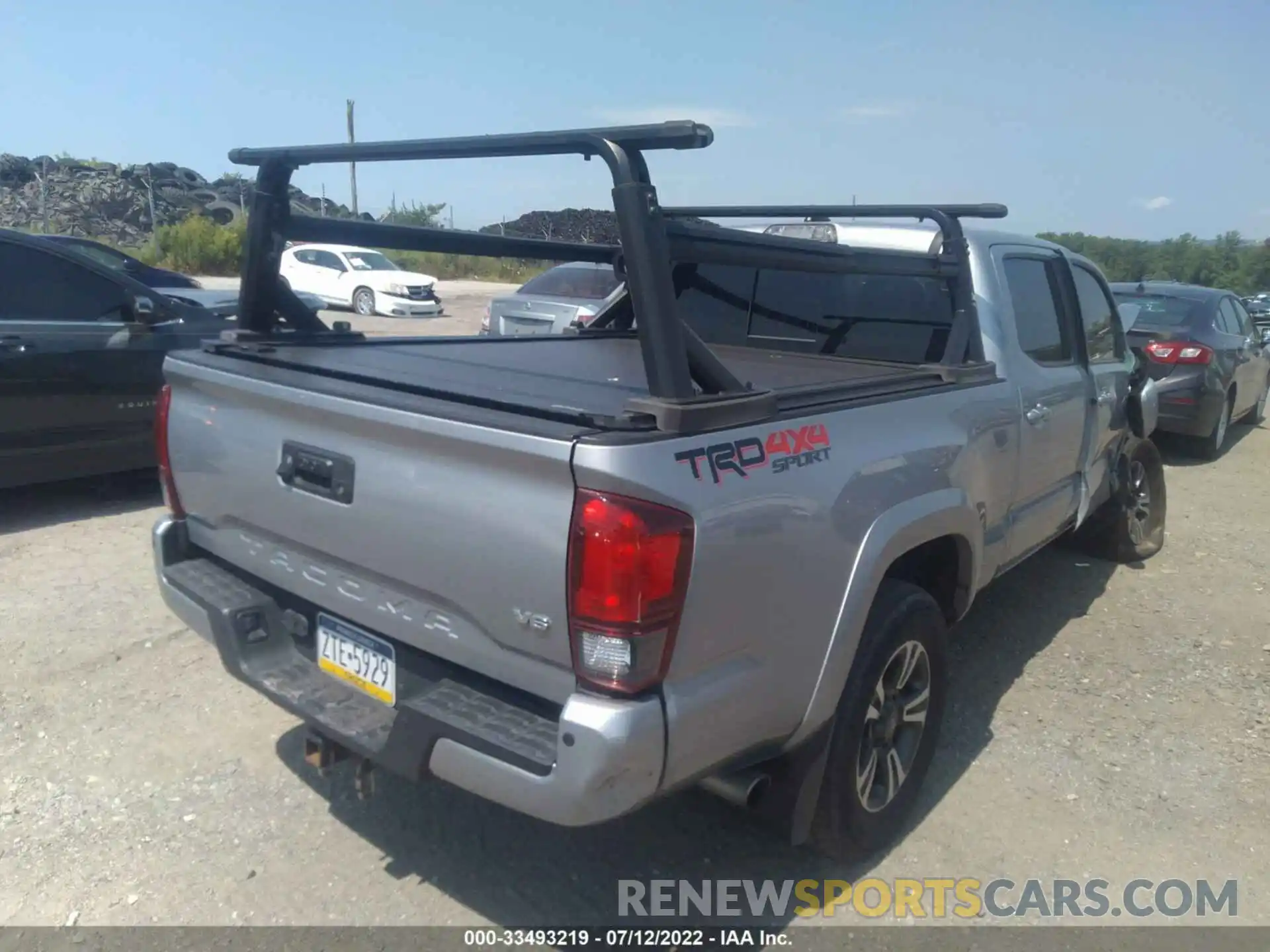 4 Photograph of a damaged car 3TMDZ5BNXKM067928 TOYOTA TACOMA 4WD 2019