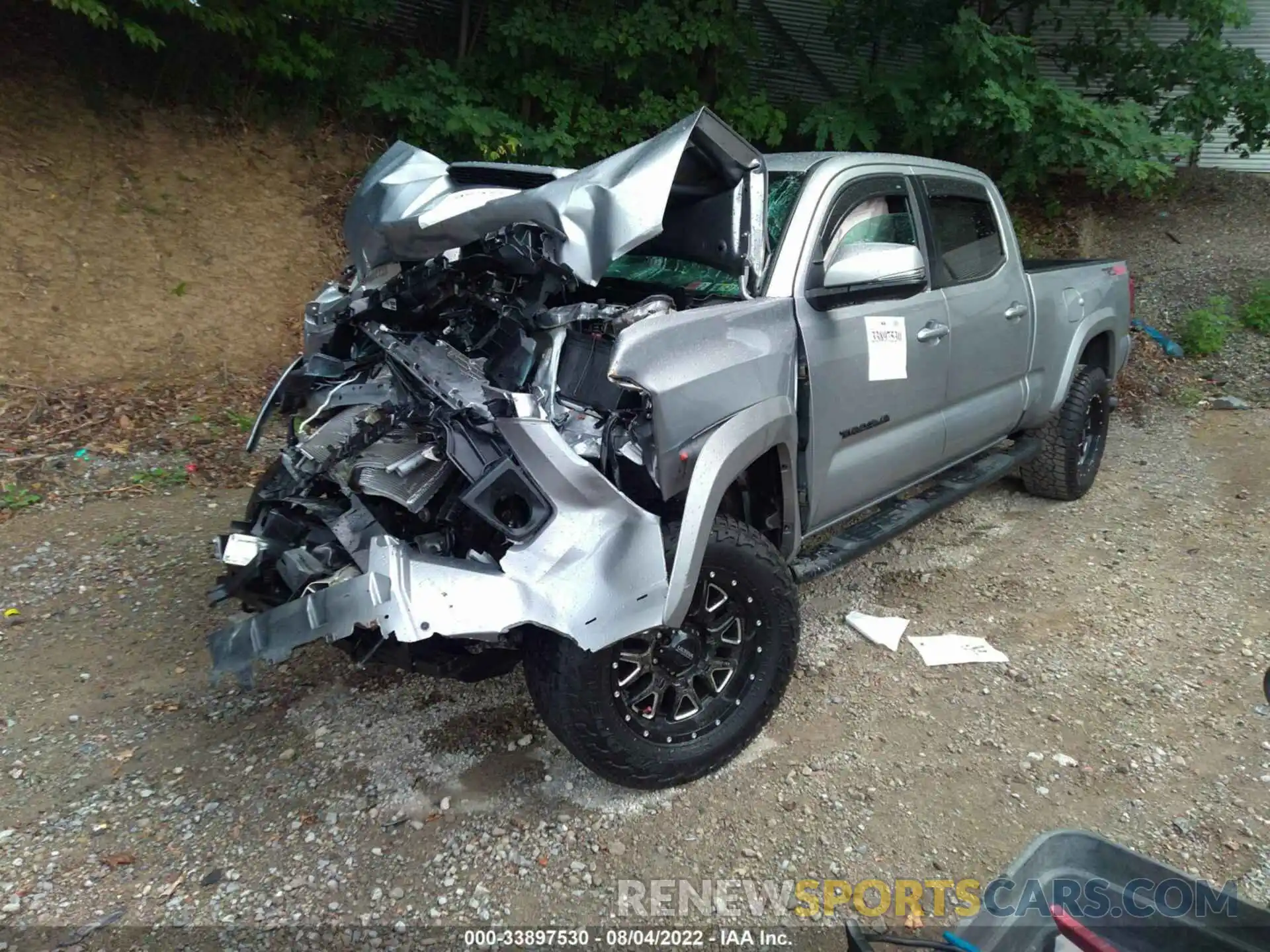 2 Photograph of a damaged car 3TMDZ5BNXKM076872 TOYOTA TACOMA 4WD 2019