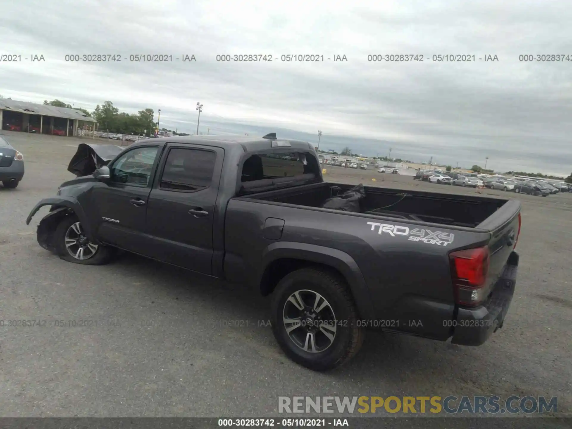 3 Photograph of a damaged car 3TMDZ5BNXKM079805 TOYOTA TACOMA 4WD 2019