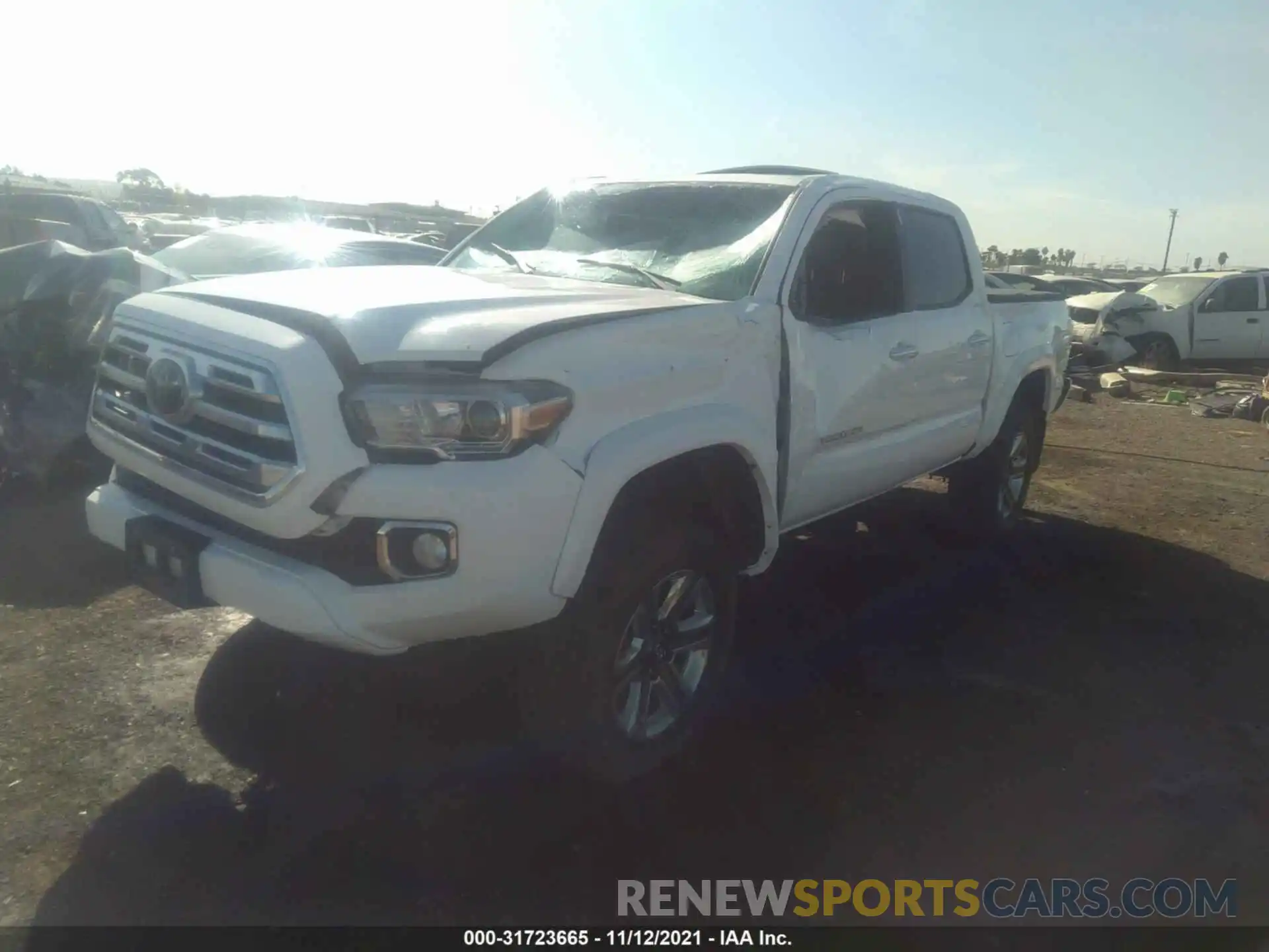 2 Photograph of a damaged car 3TMGZ5AN0KM272818 TOYOTA TACOMA 4WD 2019