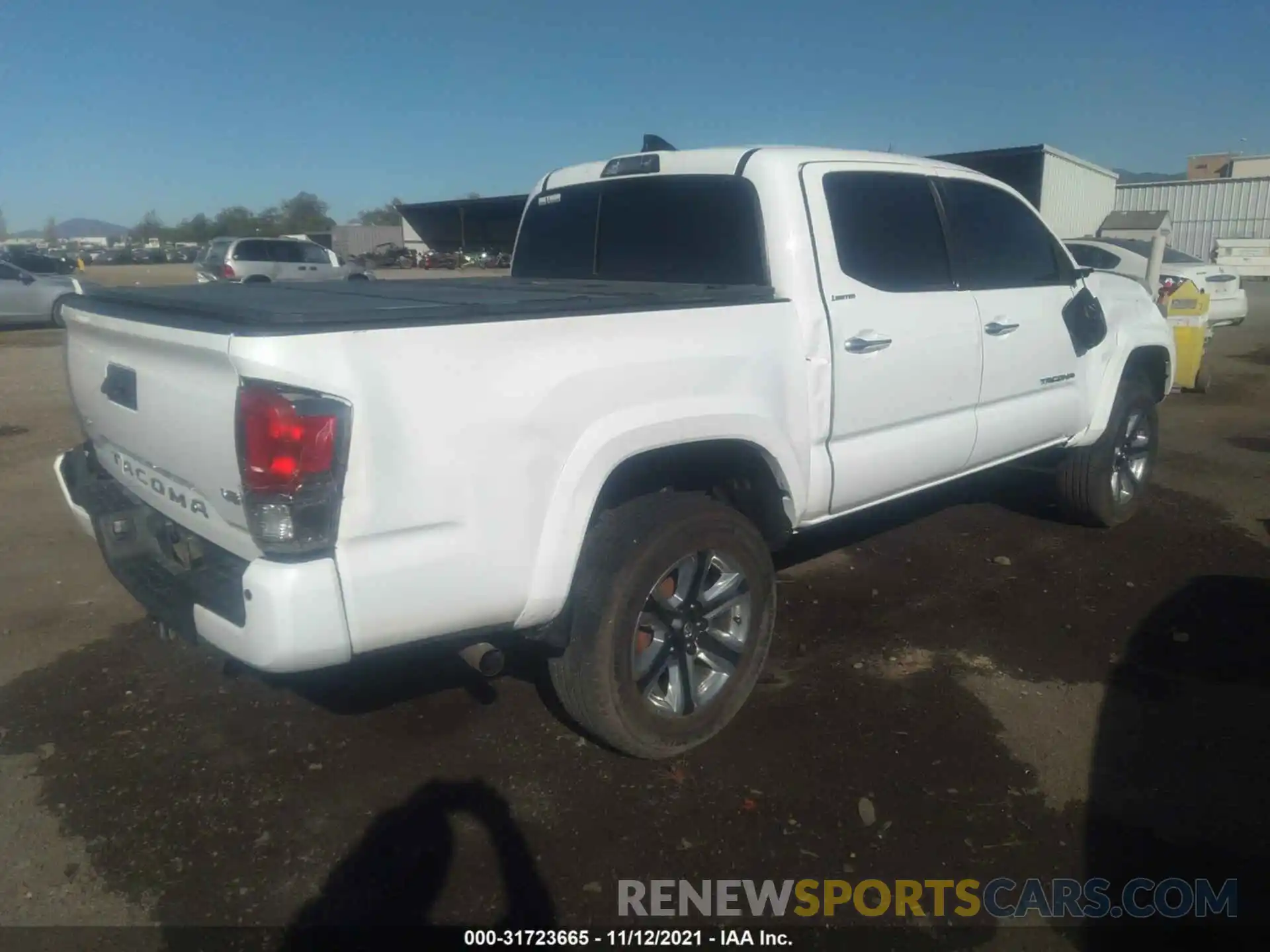 4 Photograph of a damaged car 3TMGZ5AN0KM272818 TOYOTA TACOMA 4WD 2019